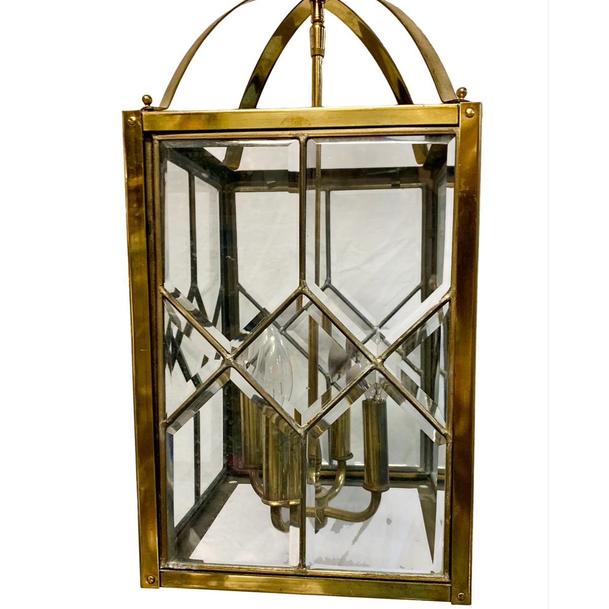 A circa 1960s Italian gilt bronze lantern with beveled glass insets.

Measurements:
Drop 25
