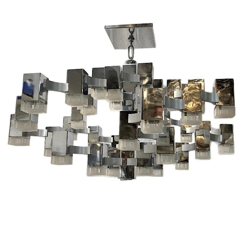 A circa 1960s Italian nickel-plated light fixture with lights covered by original molded Lucite insets.

Measurements:
Drop 24