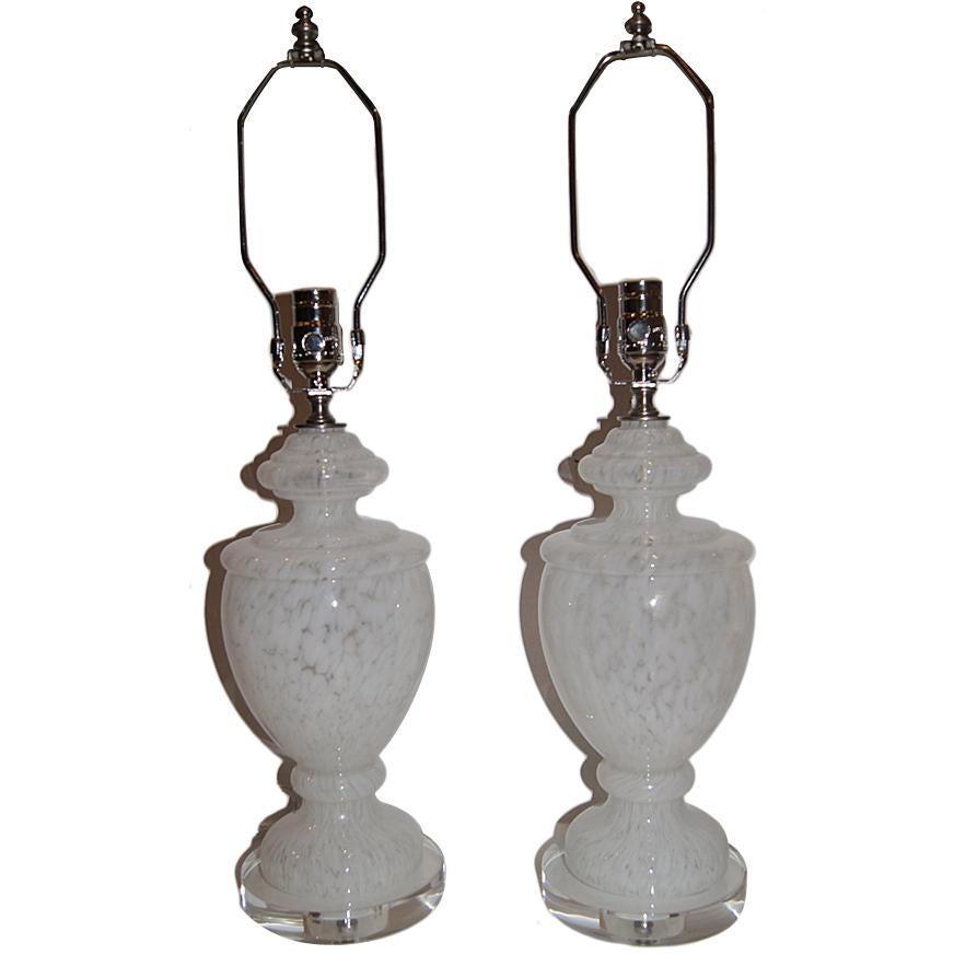 Pair of circa 1960s white and clear glass table lamps with clear bases.
Measurements:
Height of body: 14 3/4