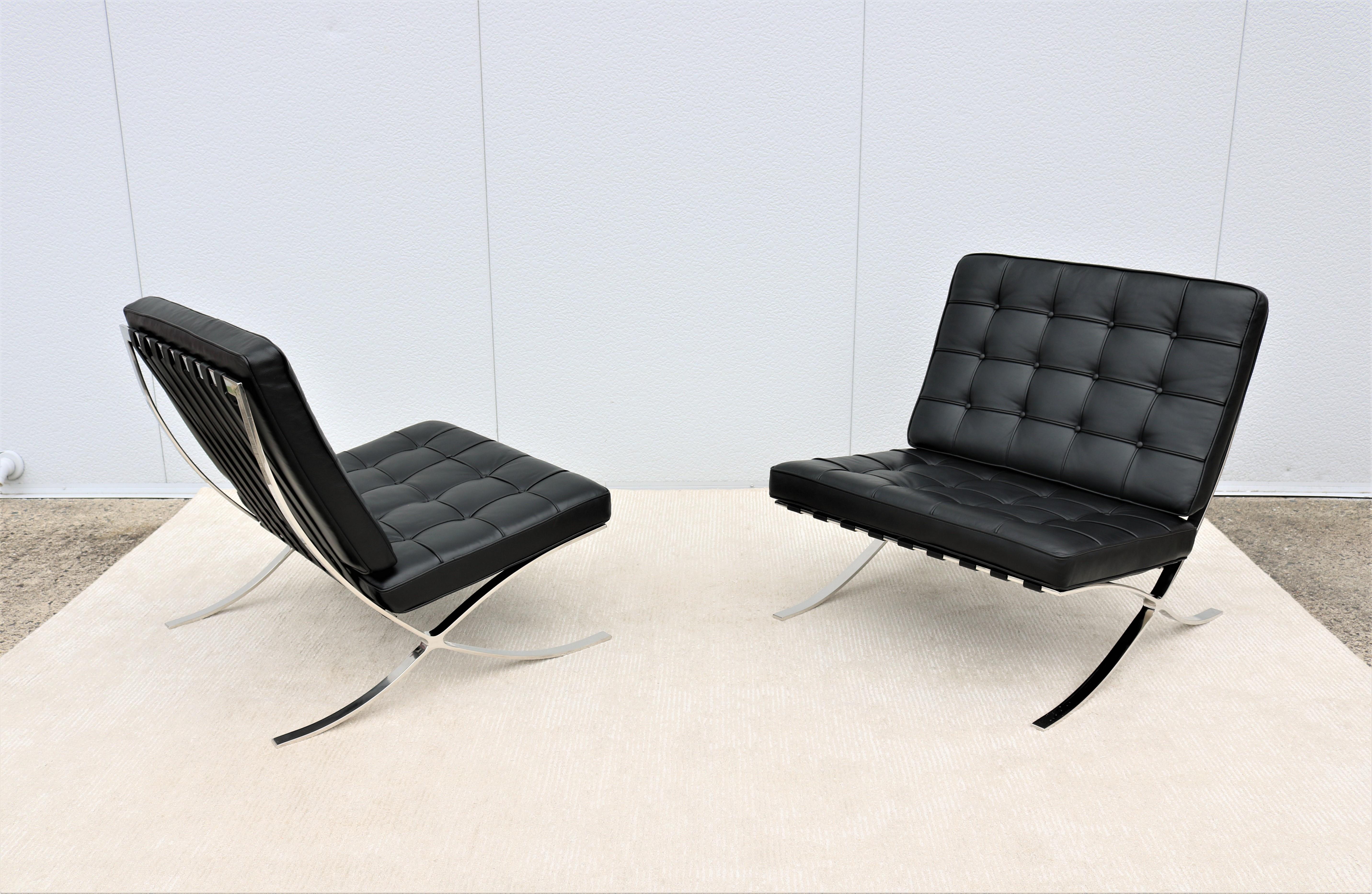 20th Century Modernism Ludwig Mies van der Rohe Black Leather Barcelona Lounge Chairs, a Pair