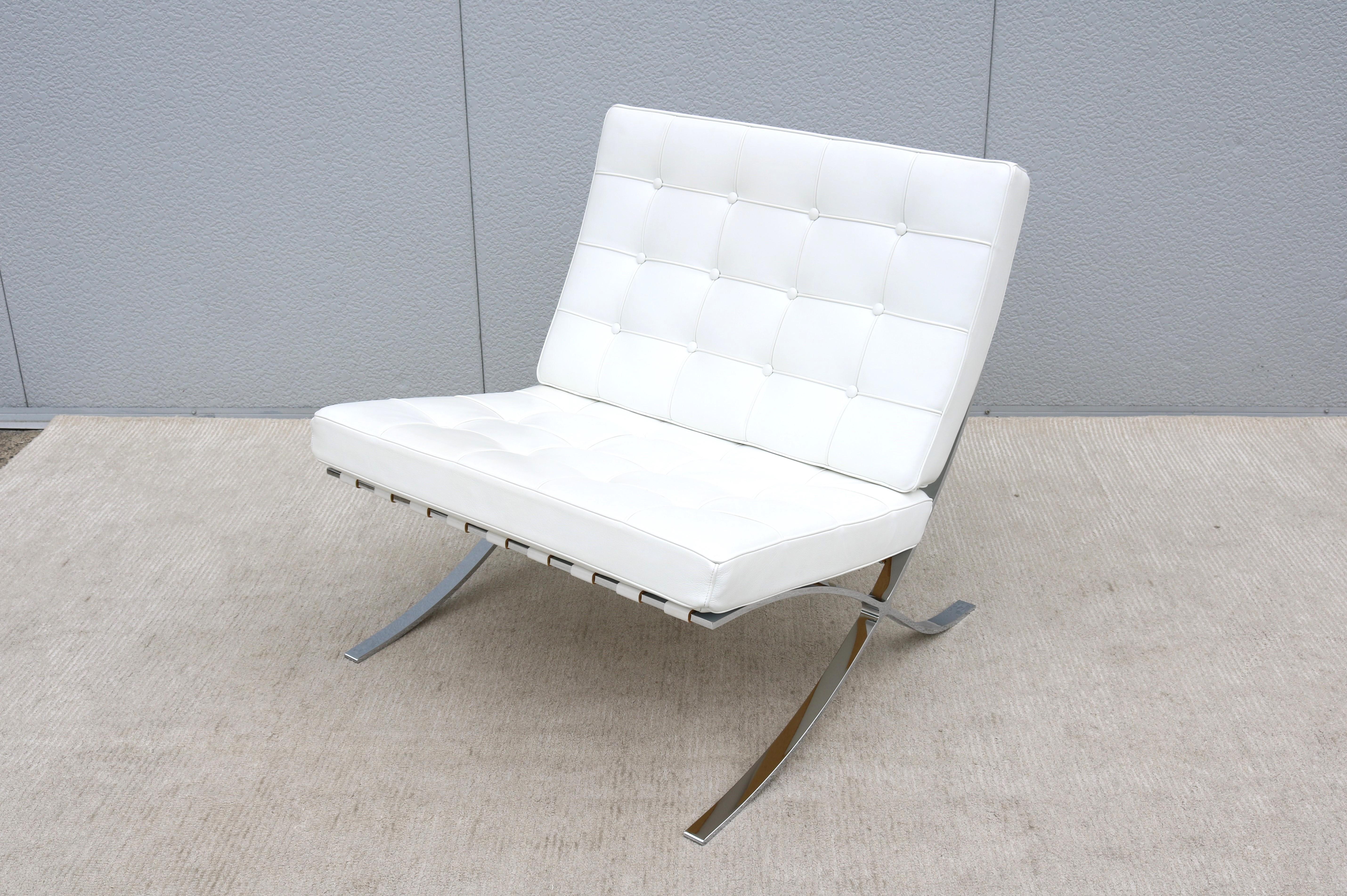 Fabulous Barcelona lounge chair in white leather, featuring triple chrome plated, barstock steel frame (No visible joints)
The classic Barcelona chair was exclusively designed by Mies van der Rohe for the German Pavilion, that country's entry for