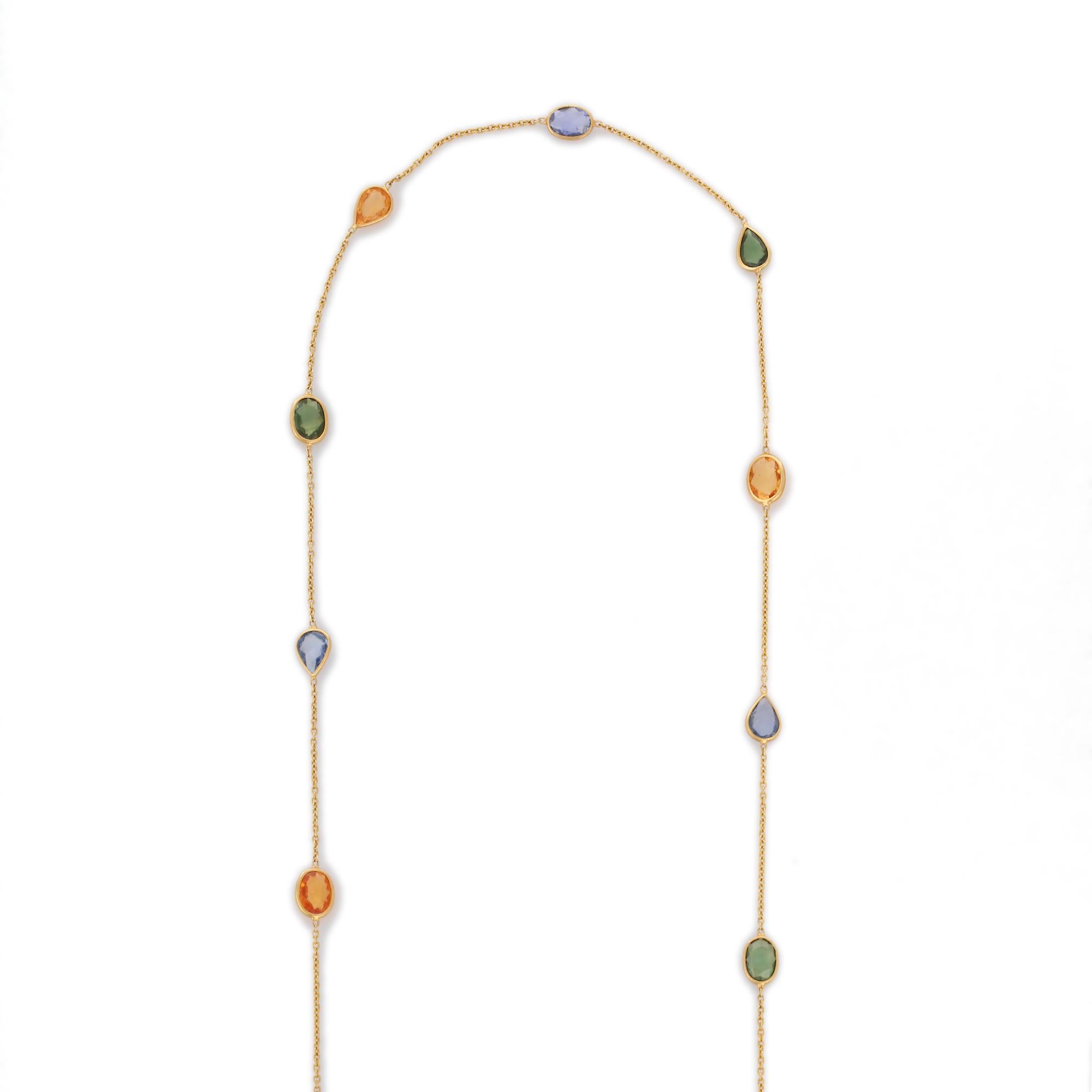 Multi Sapphire Chain Necklace in 18K Gold studded with oval and pear cut multi sapphire gemstones.
Accessorize your look with this elegant multi sapphire chain necklace. This stunning piece of jewelry instantly elevates a casual look or dressy