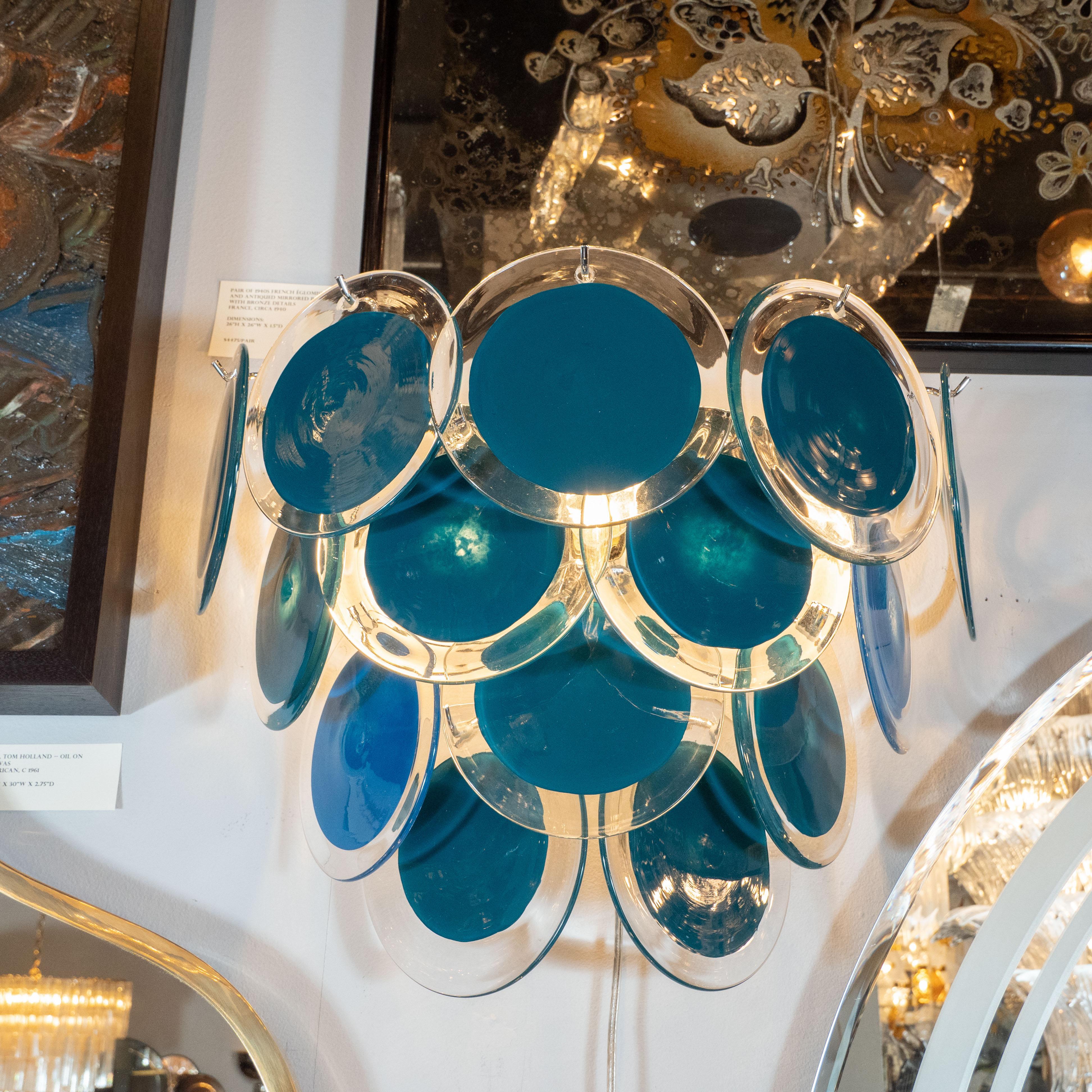 This beautiful pair of modernist 14-disc Vistosi sconces were made exclusively for High Style Deco by our atelier in Murano, Italy- the island off the coast of Venice, renowned for centuries for its superlative glass production. Realized in the