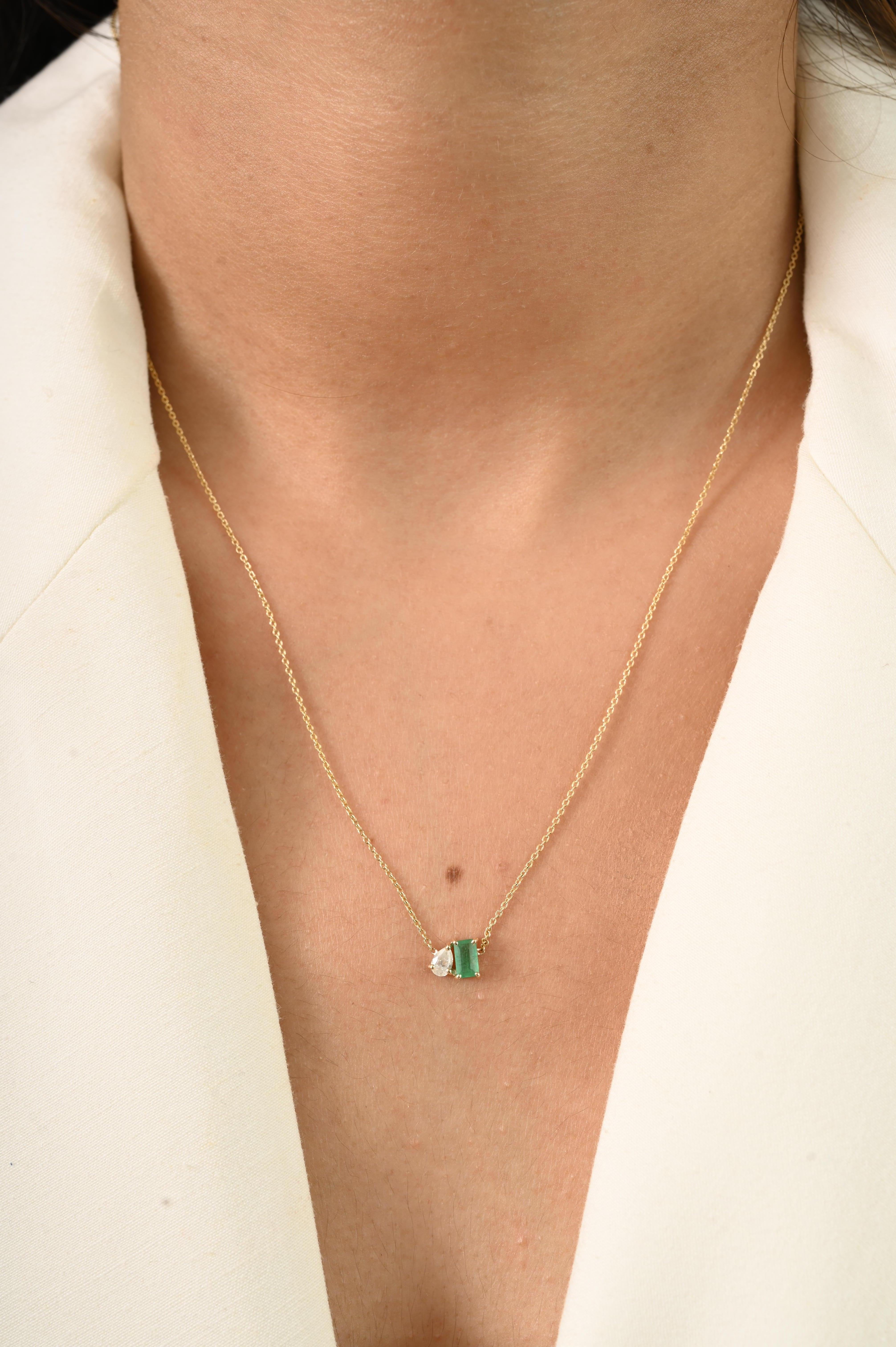 Crafted in elegant 14K yellow gold, this minimalist pendant necklace features a stunning 0.3 carat octagon-cut emerald paired with a sparkling 0.13 carat pear-shaped diamond. 
Emerald enhances the intellectual capacity. 
Designed with a vibrant
