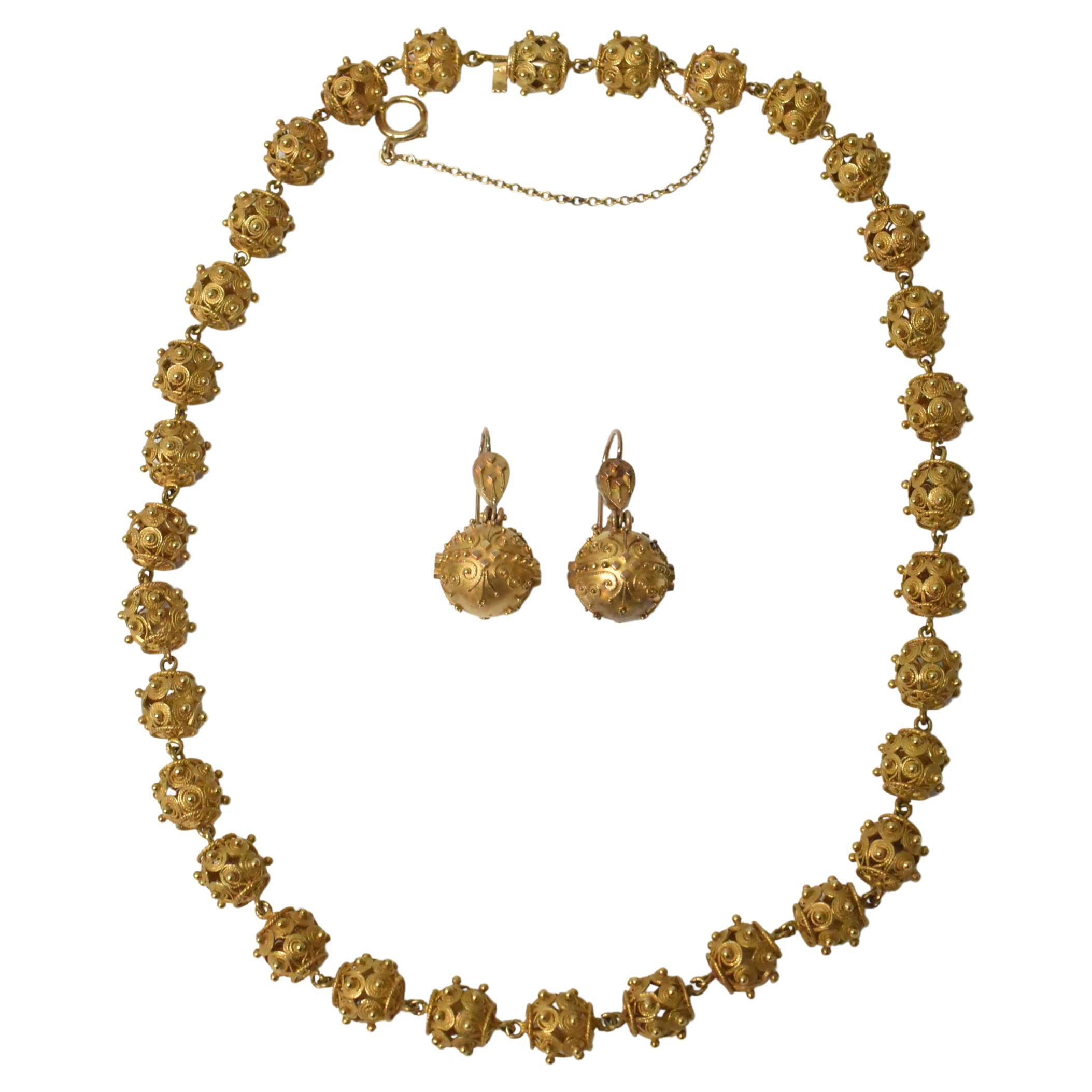 Modernistische Halskette und Ohrringe aus 18 Karat Gelbgold, Atomic-Stil im Angebot