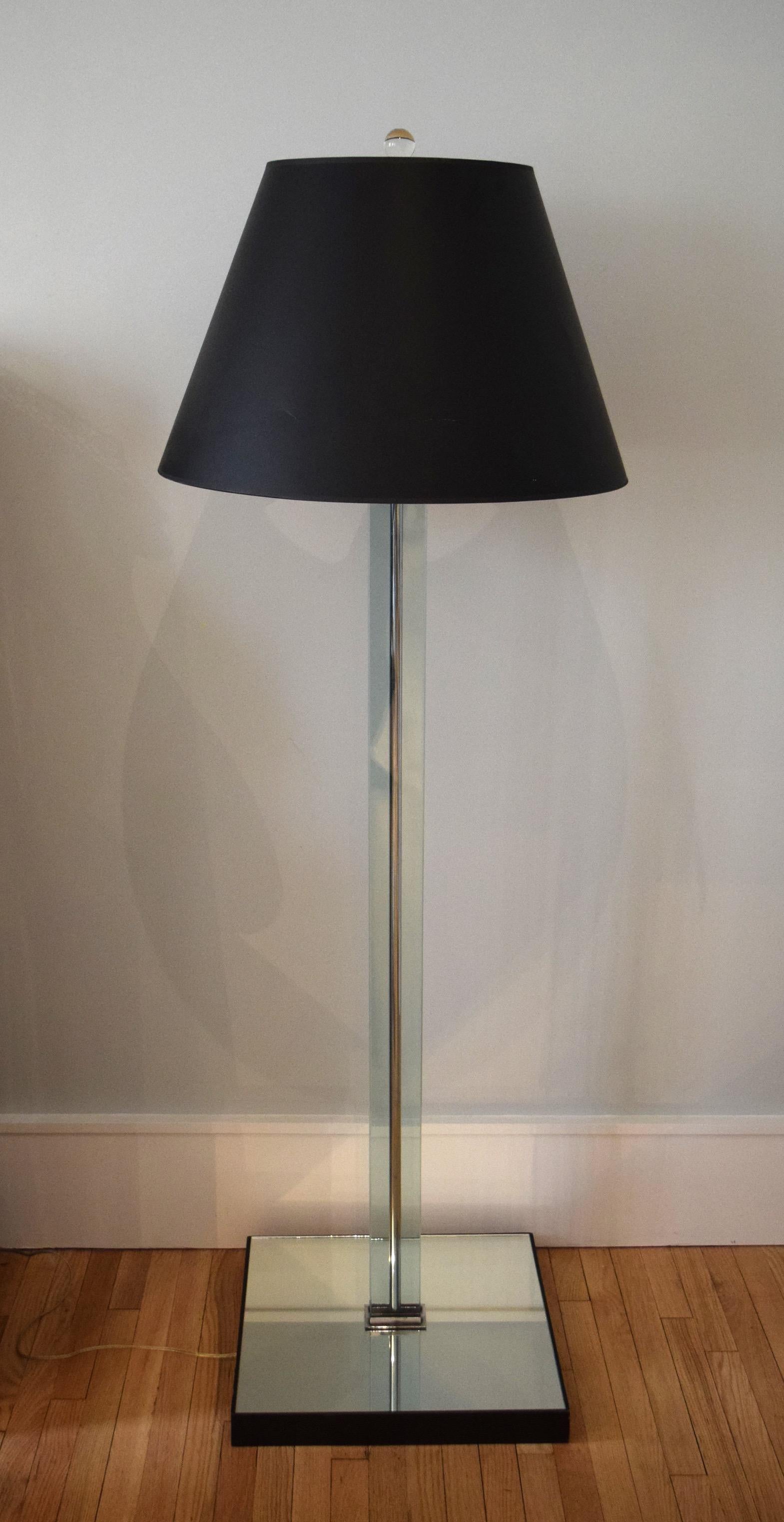This floor lamp was designed by Jacques Adnet of Paris, or under his influence by the New York decorating firm of McMillen. It was owned by the heiress, socialite, philanthropist, and art collector Doris Duke. The lamp was presumably placed in the
