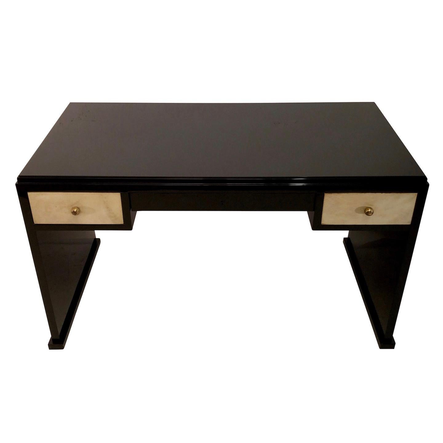 Desk with simple lines, held by two side panels.
Drawer fronts covered with parchment. 
High gloss black piano lacquer. 
Can be equipped with a glass top black in itself.
Back side also in black lacquer. 

Original Art Deco, France