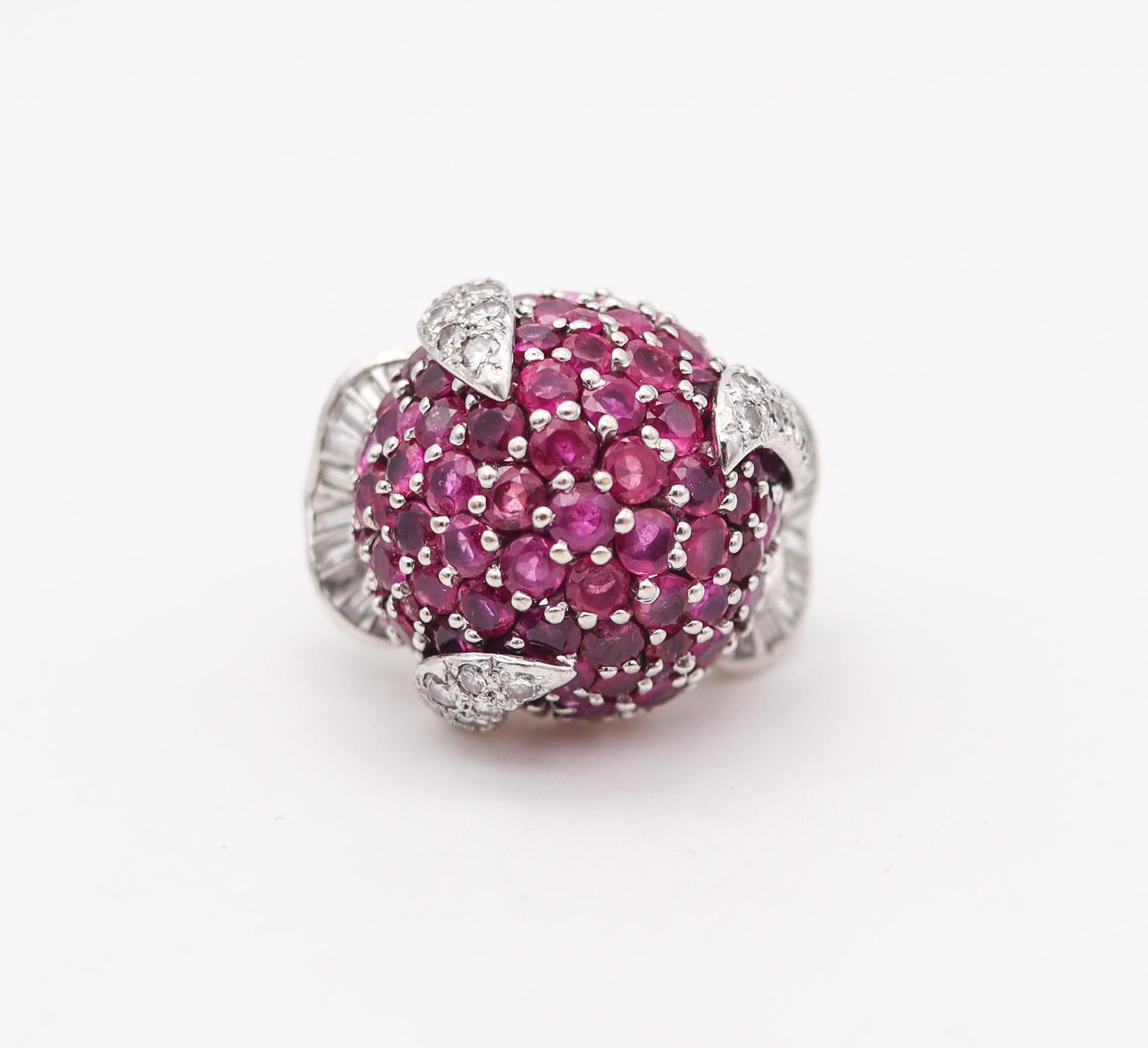 Retro-modernist cocktail ring with gemstones.

Fabulous, oversized bombe cocktail ring, created with retro-modernist patterns, back in the 1960. This cocktail ring has been crafted with a bold look and great eye appeal in solid white gold of 18