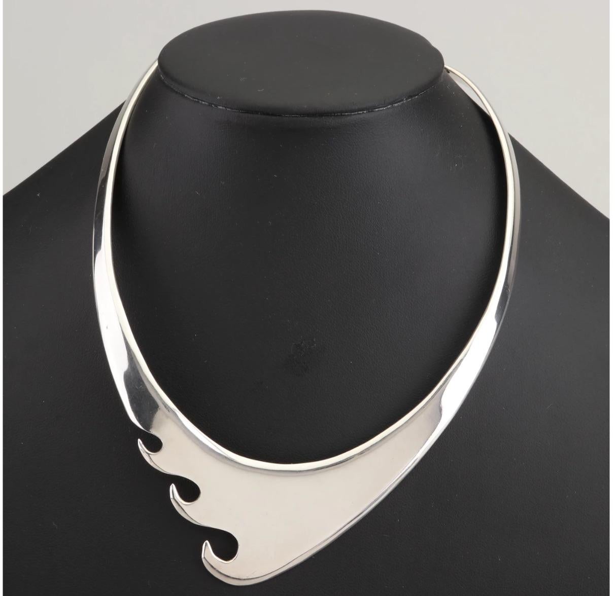 Gorgeous Modernist Mexico Artisan Sterling Silver Choker Collar Necklace.
Hand Crafted Unforgettable Distinctive Design.  circa 1960s

Style:	Mexican
Materials:	Sterling Silver
Hallmarks:	MEXICO 925 -N-49
Total Weight:	1.970 ozt