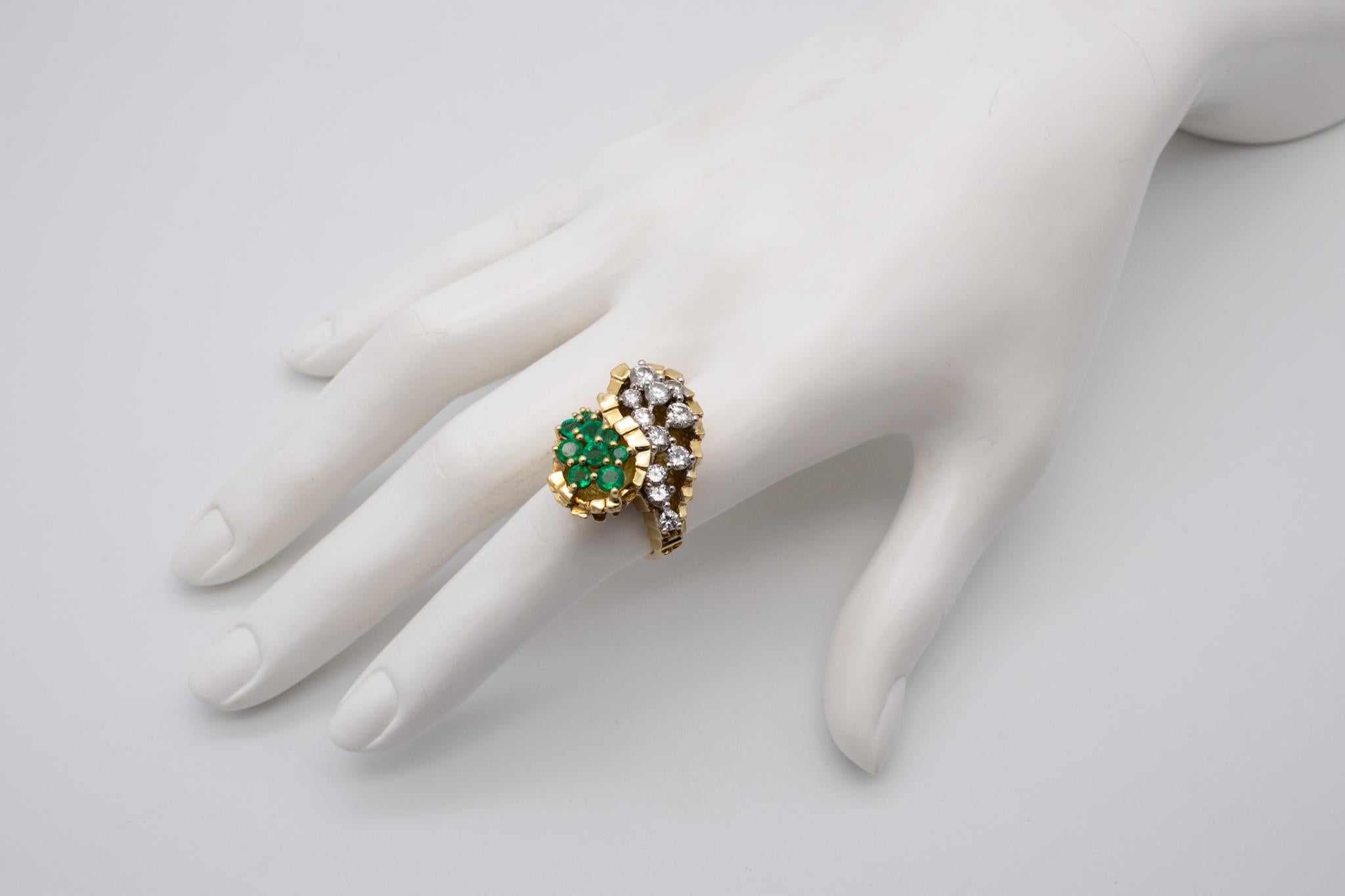 An exceptional modernist jeweled Cocktail Ring.

Very bold and unique oversized piece created in the early 1970's. This ring has been crafted, with a geometric stepped patterns in solid yellow gold of 18 karats, with very high polished