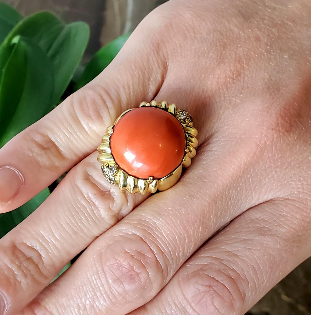 Cocktail ring with vivid red coral designed by Angelos Milano.

Fabulous statement piece, created in Milano Italy during the modernism period, back in the 1970. This bold cocktail ring has been crafted with scalloped patterns in solid yellow gold of