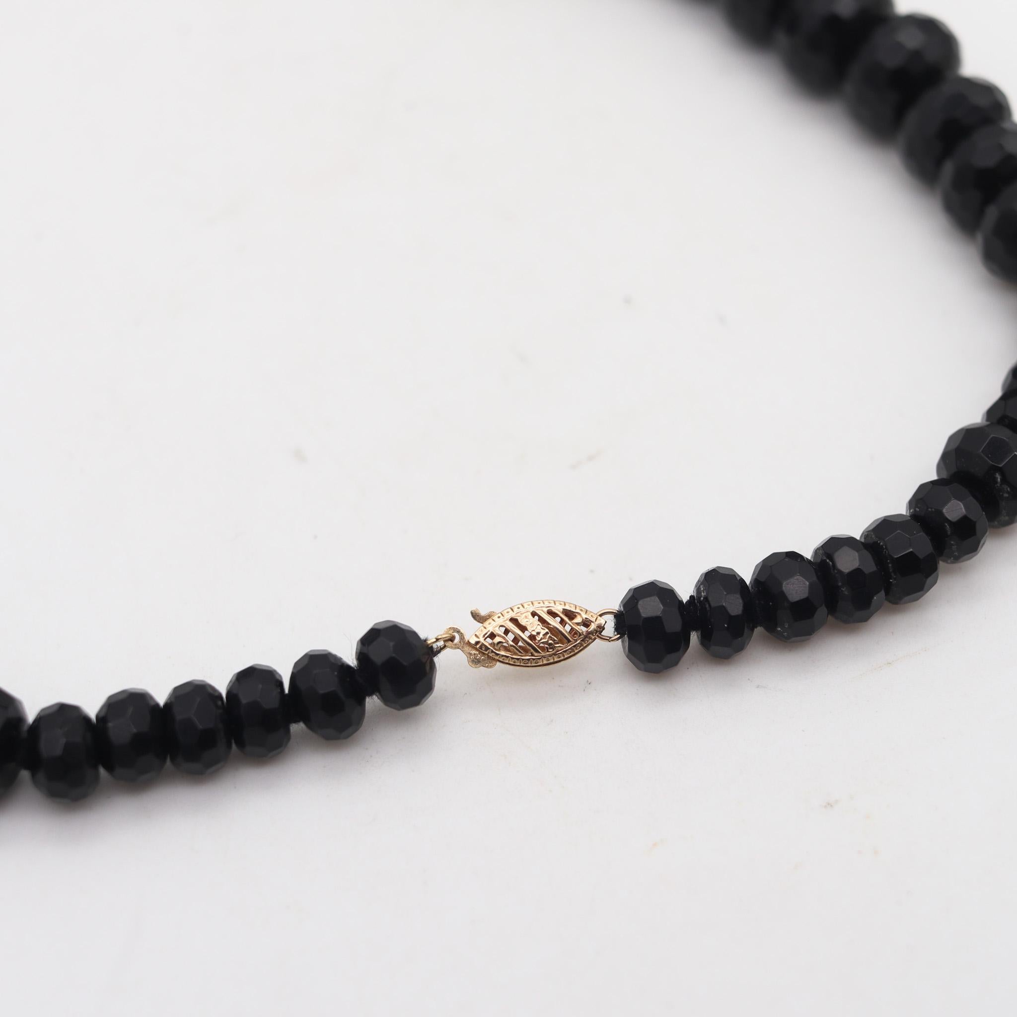 Modernist 1970 Necklace With Graduated Faceted Beads Of Onyx In 14Kt Yellow Gold For Sale 1