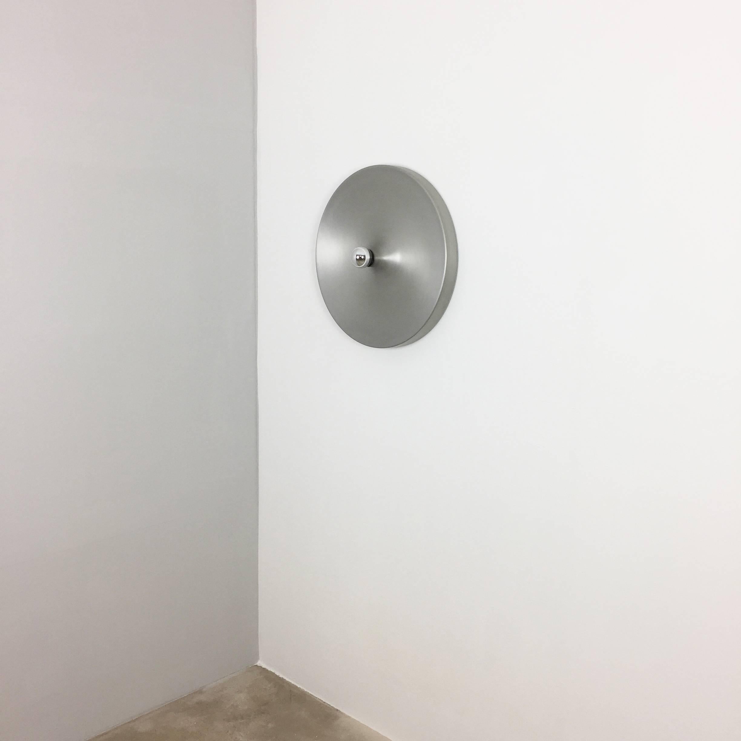 Article:

Extra large wall light sconce


Producer:

Staff lights



Origin:

Germany



Age:

1970s



Description:

Original 1960s modernist German wall Light made of solid metal. This super rare wall light was produced in