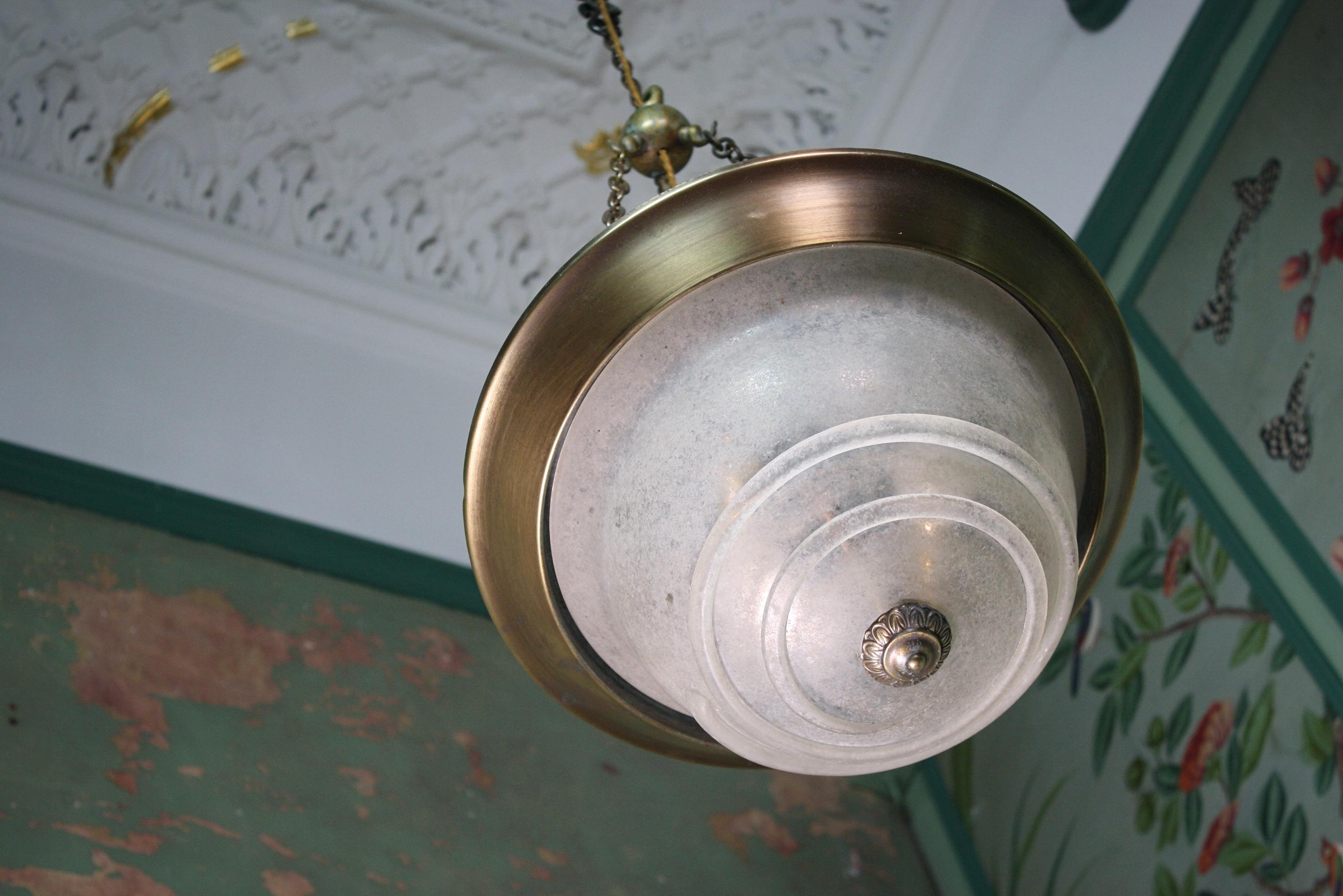 A very unusual 20th century (third quarter) plafonnier pendant in the neoclassical style, with a deep dish thick glass bowl and applied glass spiral decoration. Likely would off originally been flush mounted to an outdoor ceiling or wall and have at