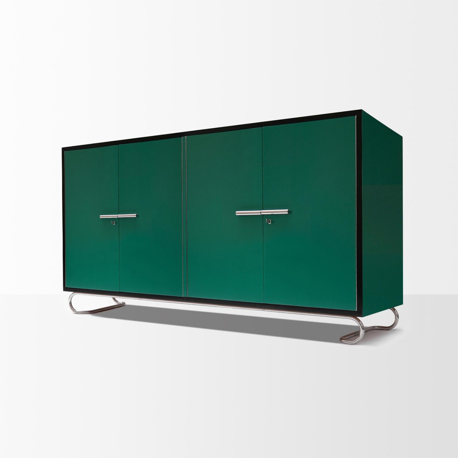 Modernist rectangular 4-door 'Dahlem' credenza designed by GMD Berlin - Studio and manufactured by GMD Berlin. Handcrafted wood with lacquerer finish, chrome-plated tubular steel base and handles.

Available on request in different colors, finish