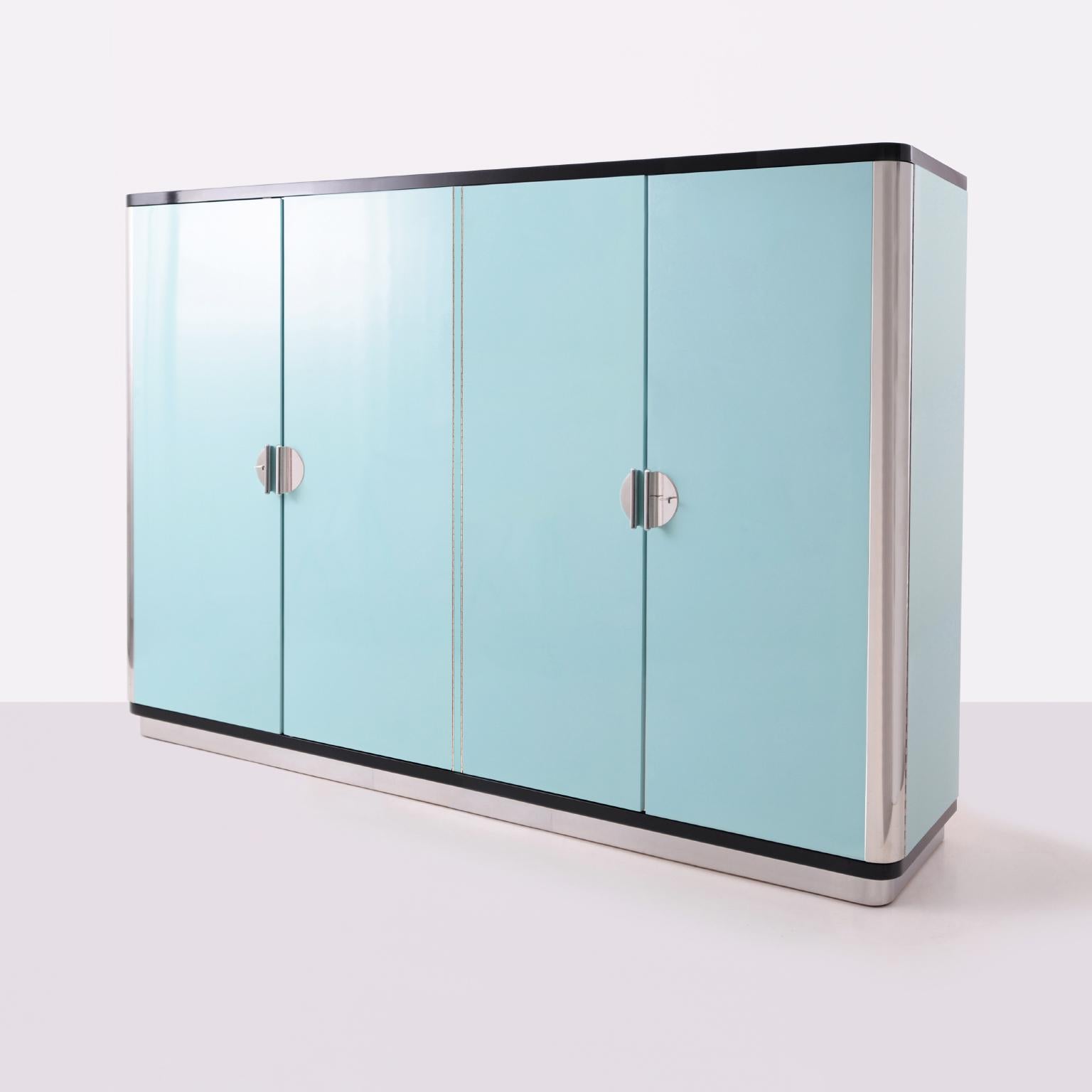 Customized four-door wardrobe, manufactured by GMD Berlin, exclusively presented in our Rudolf Vichr Collection.

These high-quality, handmade furniture in a classic modern timeless design, are made from selected materials according to traditional
