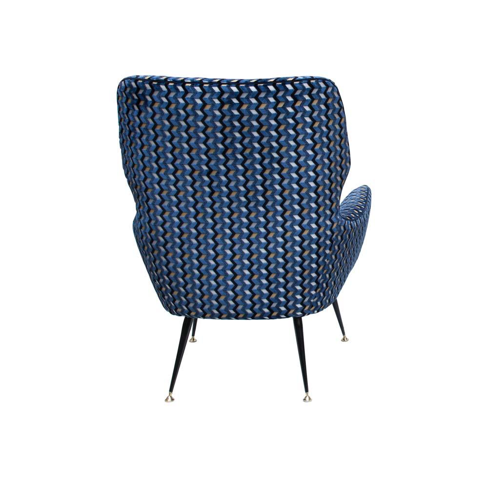 An of early 1950s Italian design armchair, completely upholstered wooden frame on black enamelled wrought iron tapered legs ending with brass feet.
Newly upholstered in a precious geometric patterned precious velvet fabric in blue or gold or black