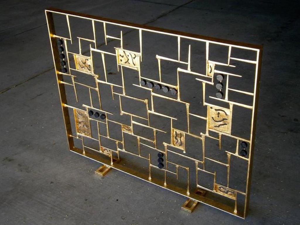 A contemporary gilded and blackened metal fire screen, hand-fabricated by American Studio artist Del Williams. The 