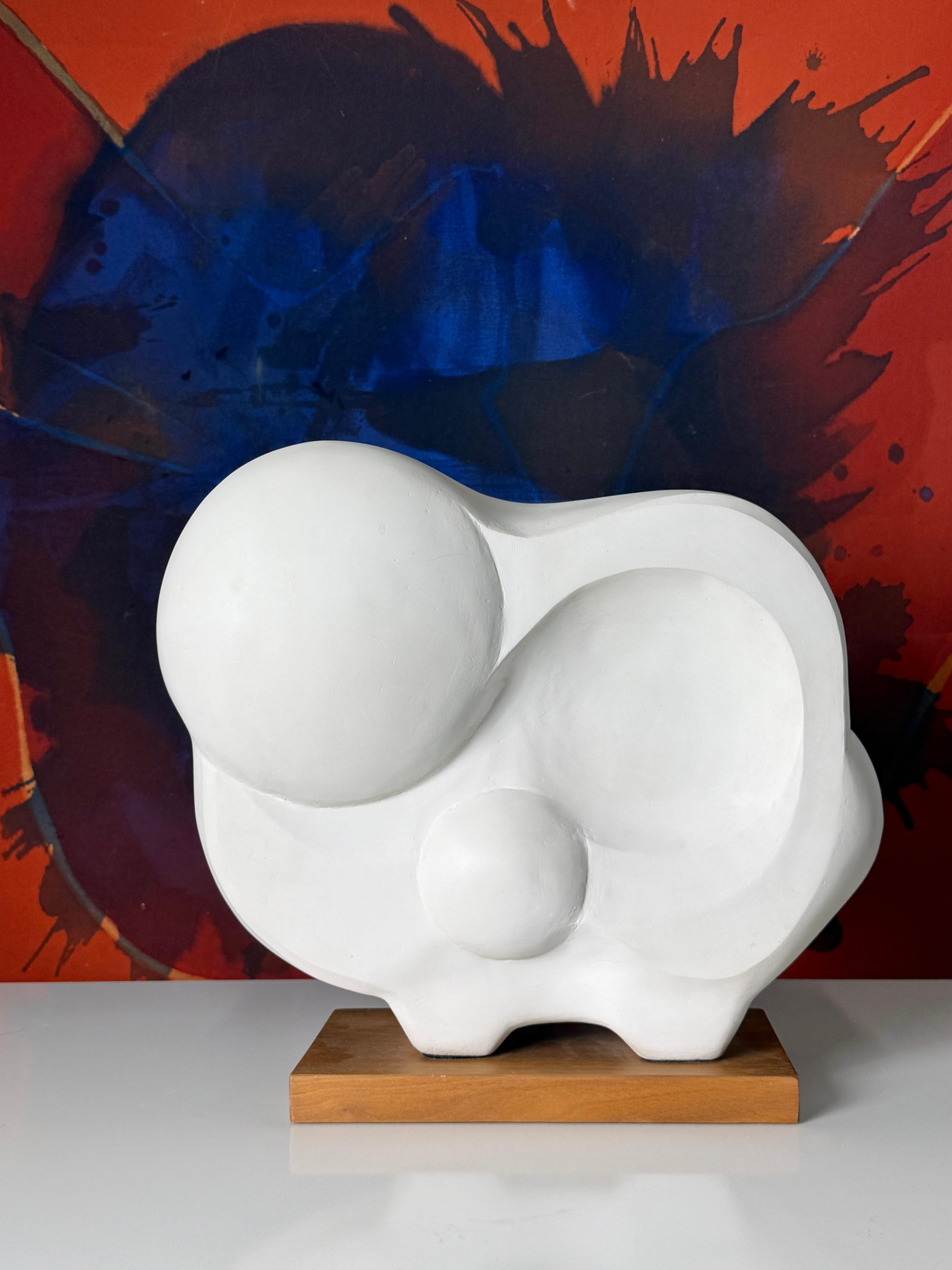 Original abstract white plaster sculpture circa 1990s

Amorphic organic piece executed in white painted plaster with a captivating amalgam of concave and convex dimension

Signed by artist back lower left

16 inch width
8.5 inch depth
16 inch