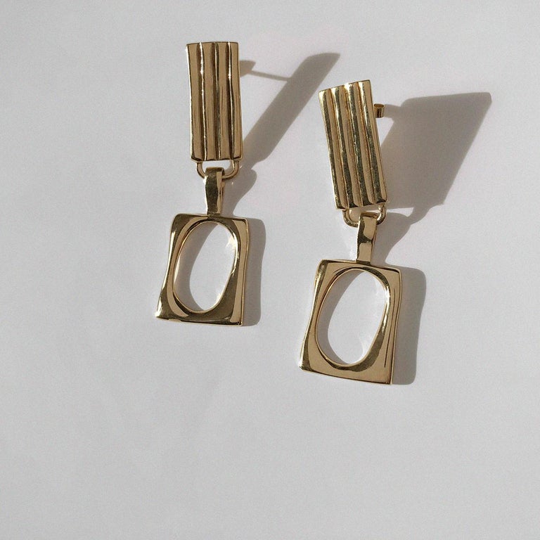Auctions | A PAIR OF GOLD DROP EARRINGS in modernist design