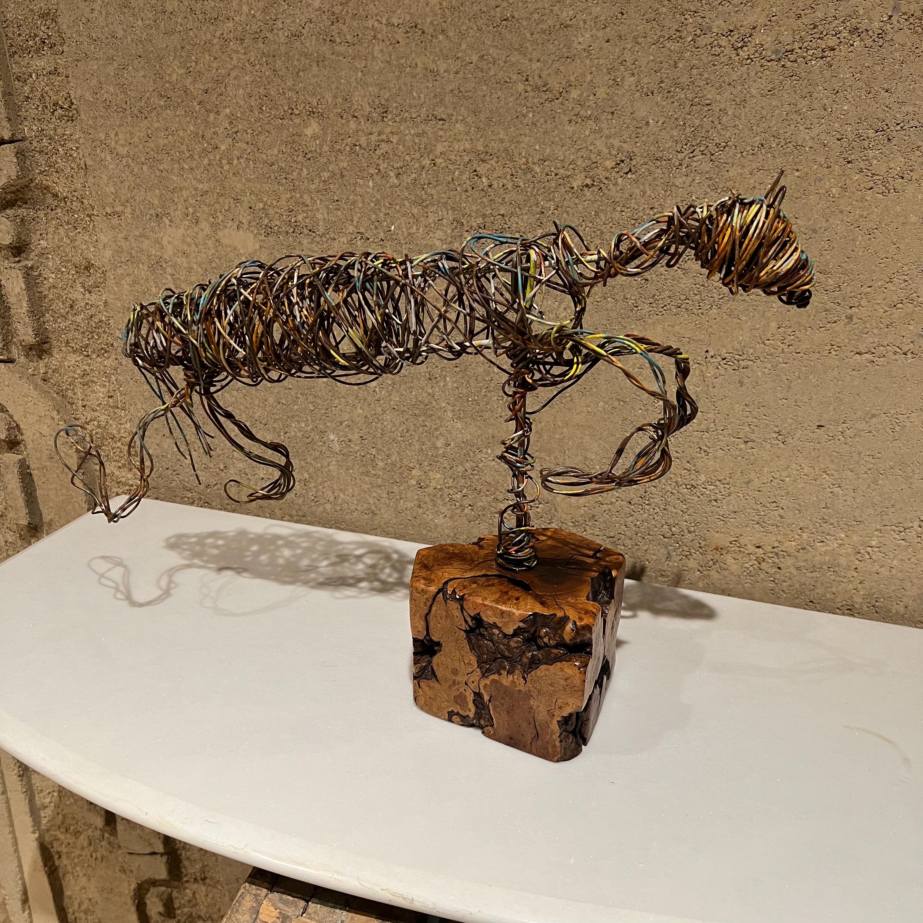 Sculpture
Modernist Art wire horse sculpture, painted, mounted on an Exotic Wood base.
In the style of Marcello Fantoni for Raymor
Measures: 12.25 tall x 5 wide x 18.5 long
Preowned original condition unrestored. 
Refer to images provided.
 