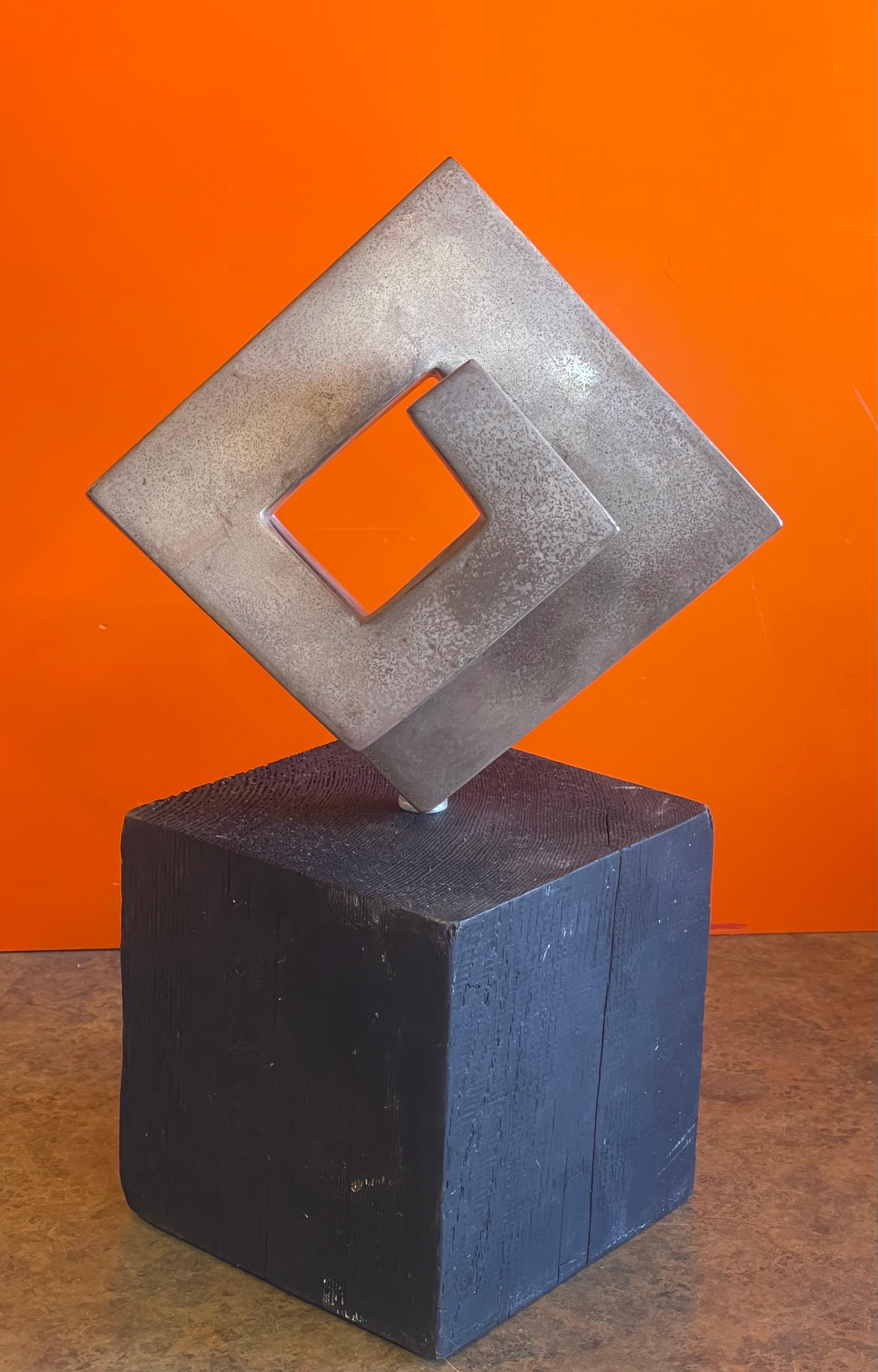 Modernist Abstract Rotating Sculpture on Wood Base In Good Condition For Sale In San Diego, CA