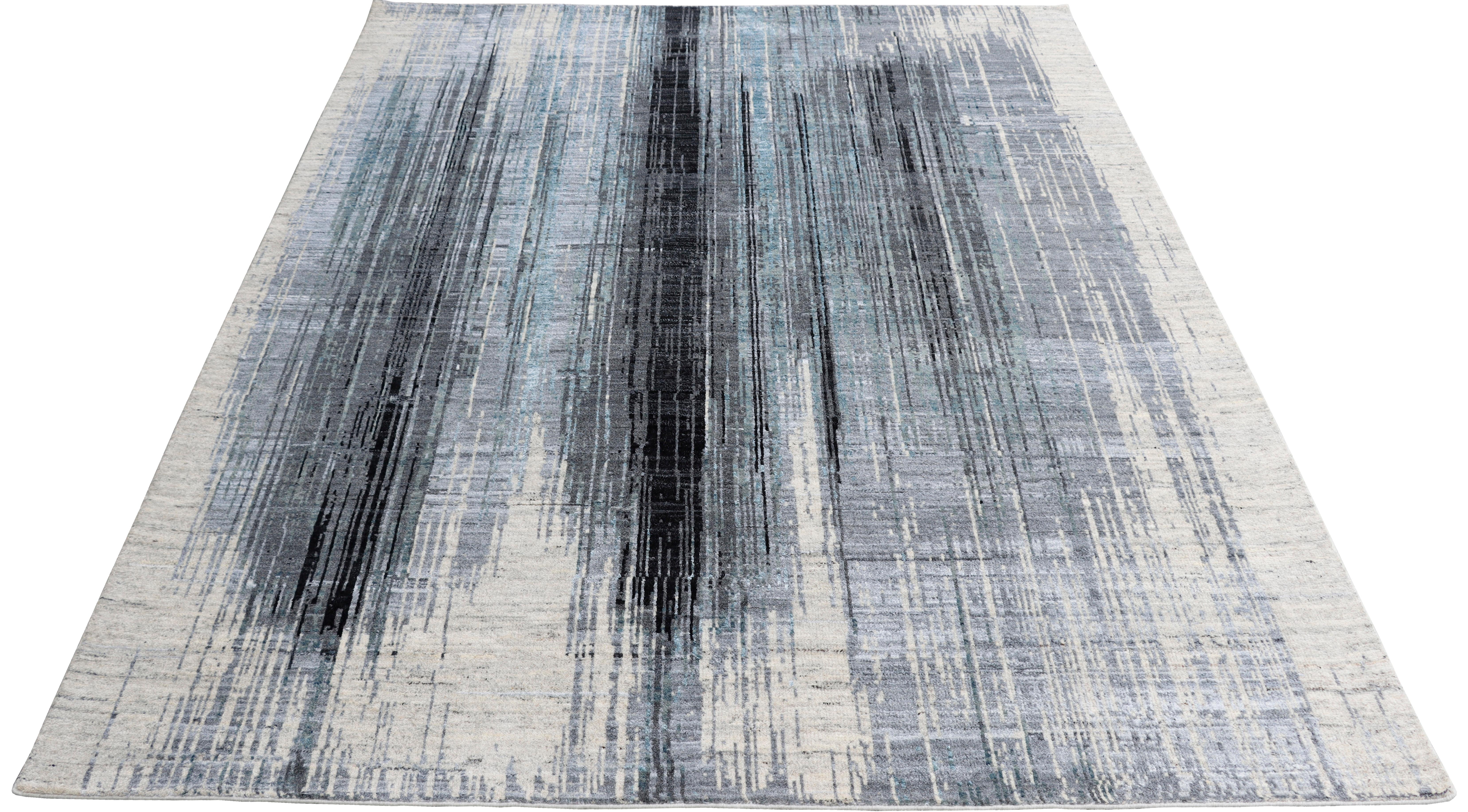 The contemporary classic designs bridge the gap between transitional and Postmodern, with an overall classic sensibility. Rug patterns include abstract, geometric, overall, organic, patchwork and jacquard patterns. The hand-knotted rugs are