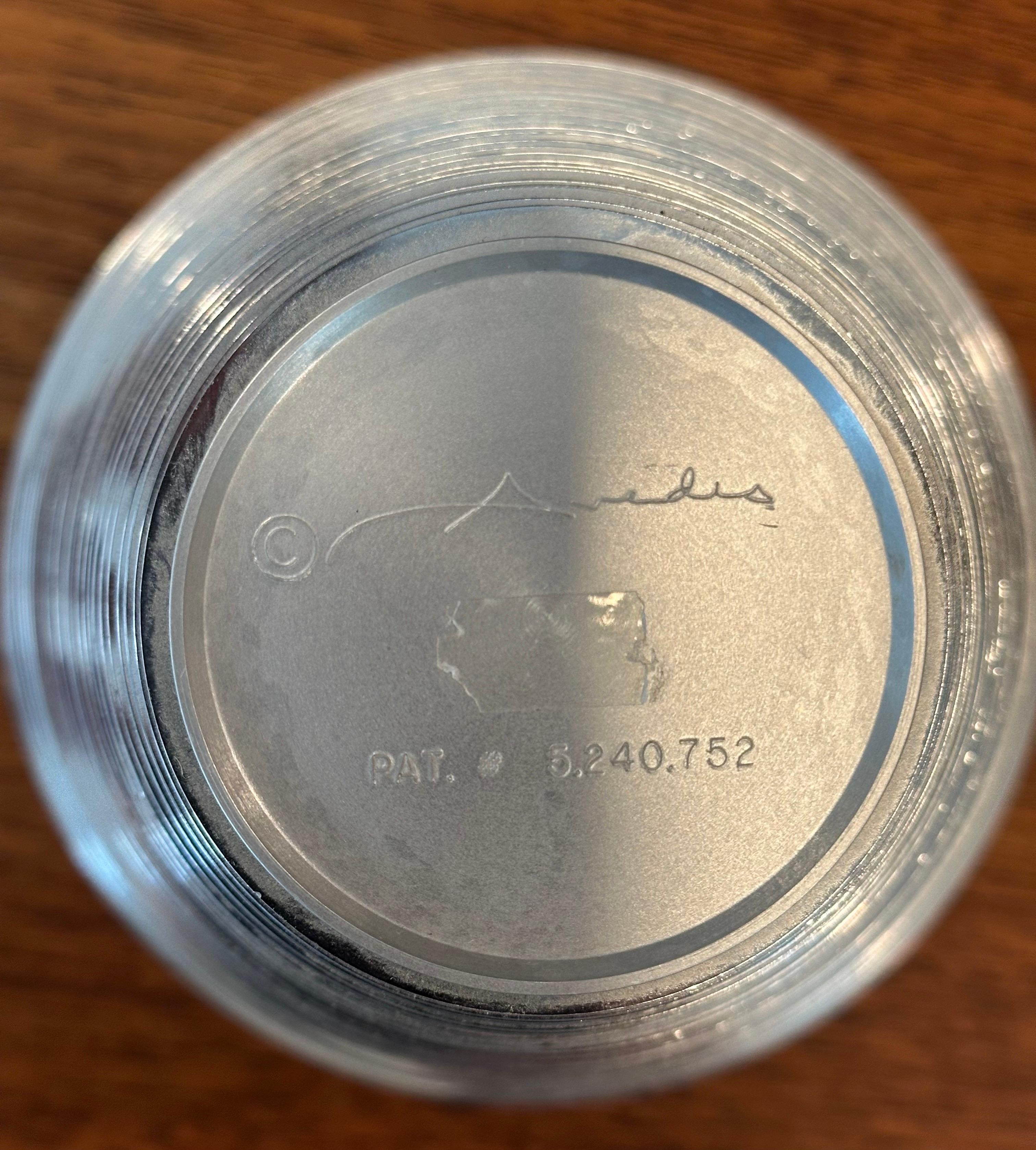 Vase moderniste en anneau d'aluminium 