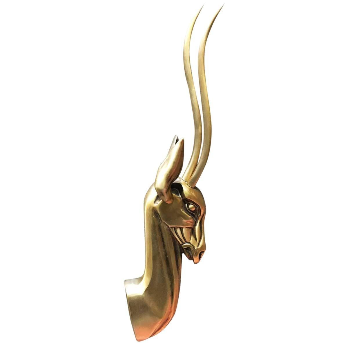 Highly detailed anodized aluminum Gazelle wall sculptures featuring two Gazelle bust profiles. Designed by Jacques Richard for Pendergast Products.

The busts hang parallel to the wall and have flat sides for seamless hanging.

Molded hooks on the