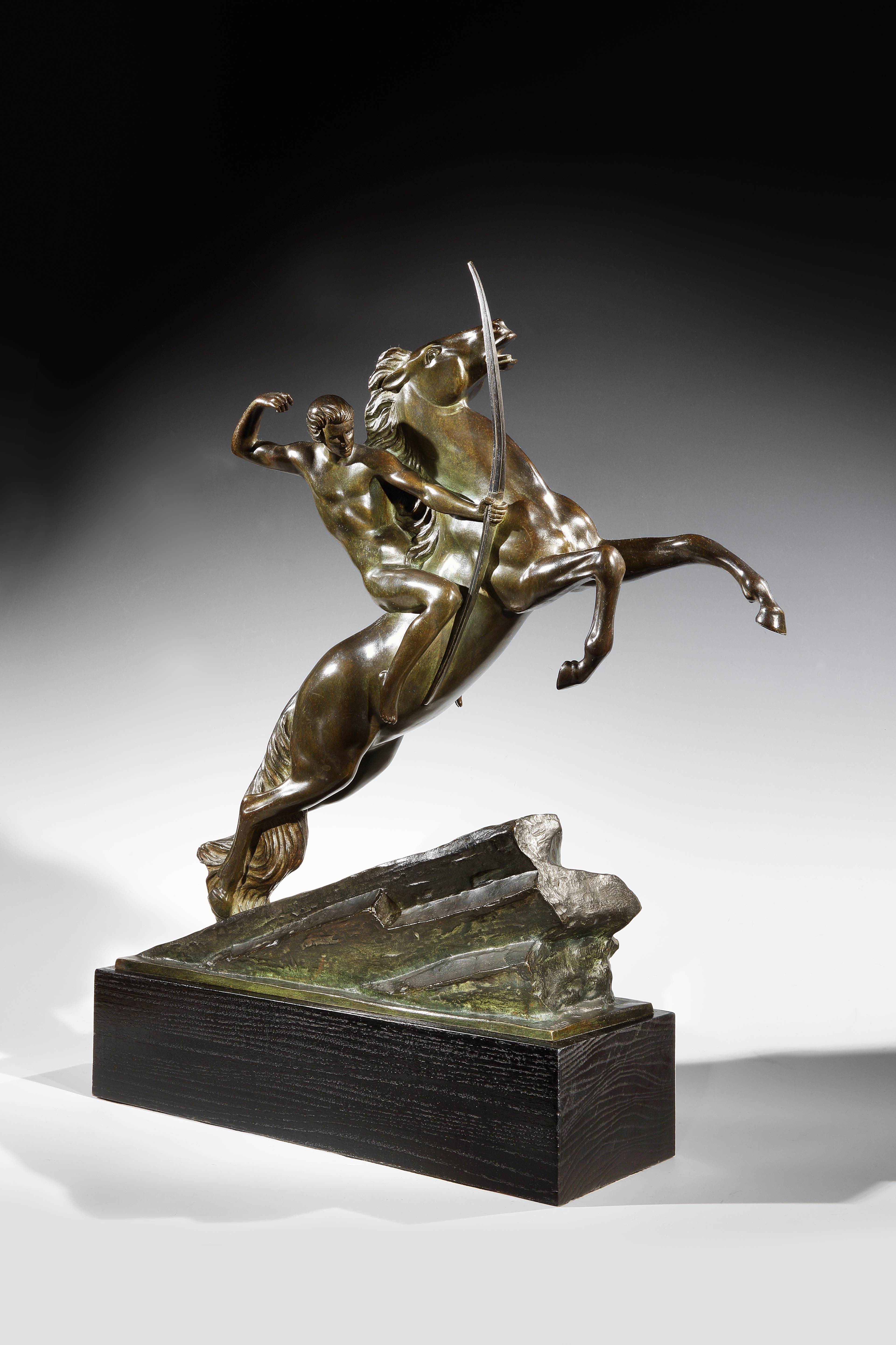 Armand Lemo, (French, 1881-1936).

A fine modernist Art Deco bronze, modeled as a stylized Archer with bow on horseback, the horse rearing up on a sloping socle, the bronze mounted on a plain contemporary ebonized rectangular hardwood plinth. 