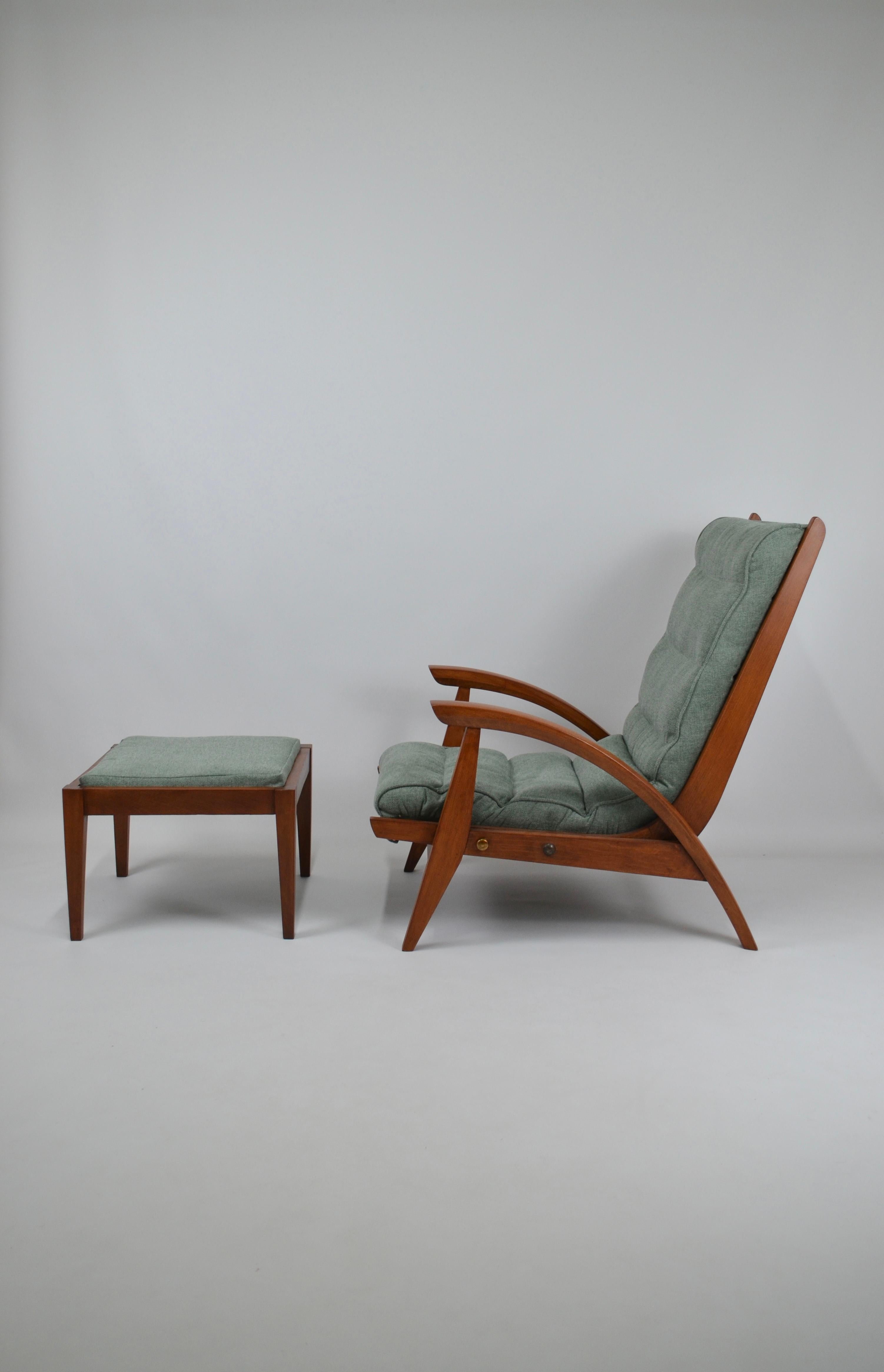 Rare modernist armchair with ottoman, in solid oak, by Guy Besnard, for Freespan model 
