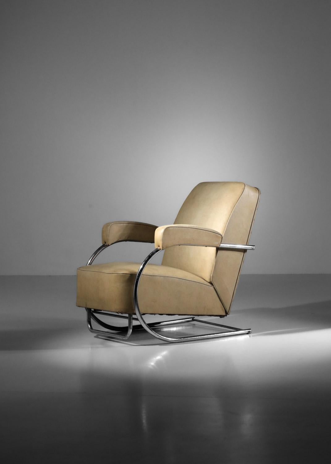 Faux Leather Modernist armchair in chromed steel tube and imitation leather from the 40's For Sale