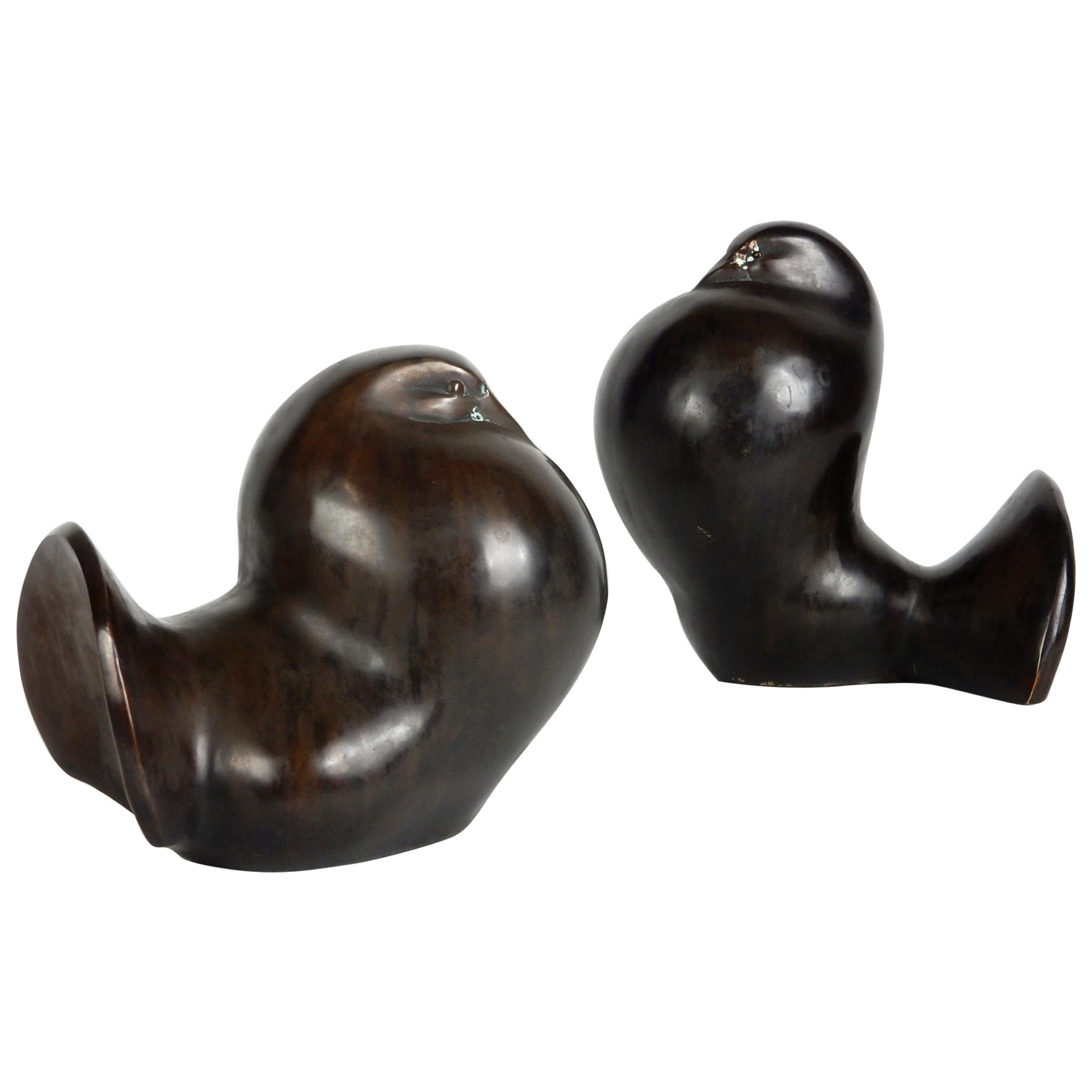 Pair of plump morning doves in the style of Barbara Hepworth.
Done in bronze, signed in cast on the inside of smallest (pictured)
They retain a wonderful patina.