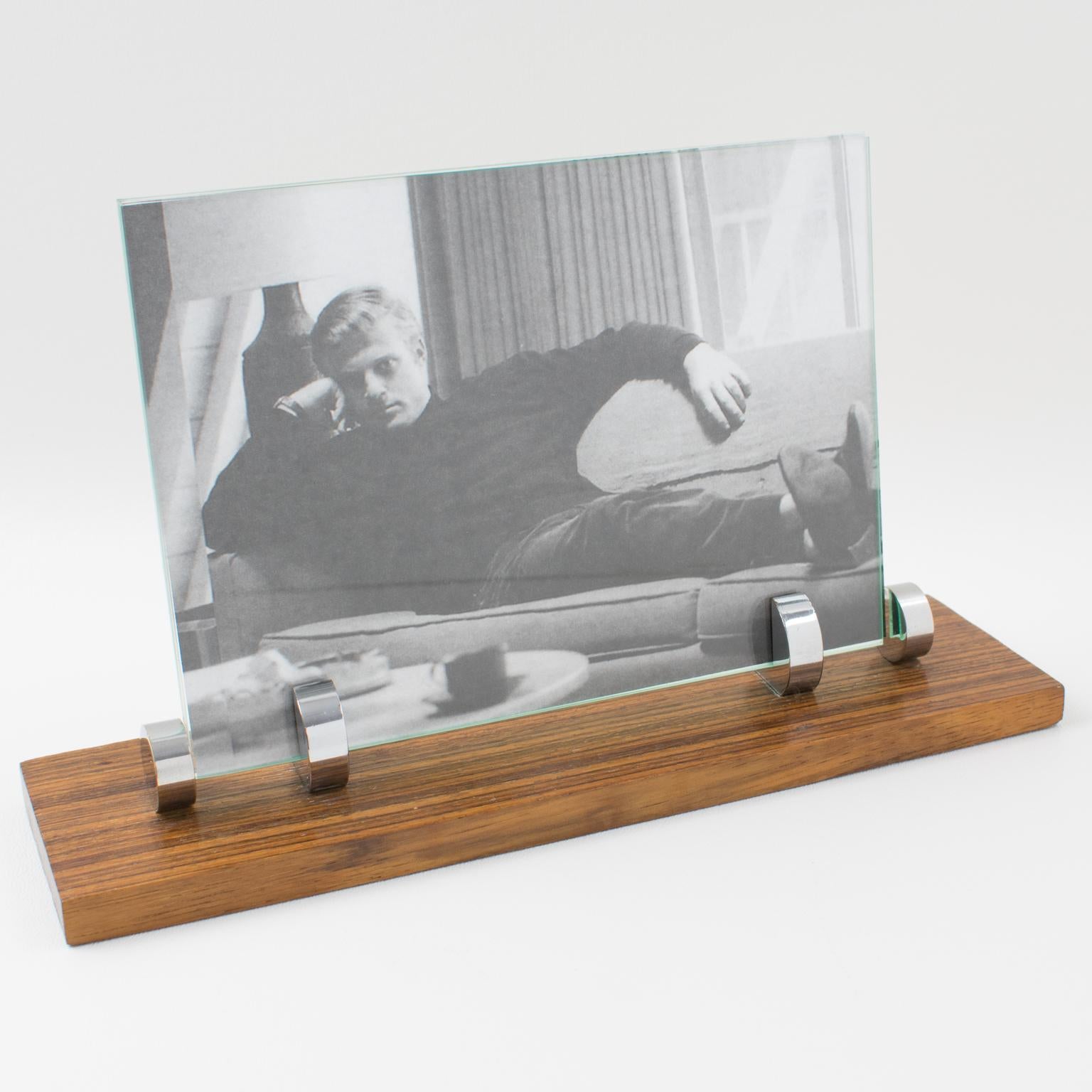 Lovely French Art Deco picture photo frame, featuring thick hand-rubbed Zebra wood (Zebrano) plinth compliment with polished chrome metal holders and accents. The frame is complete with its two glass sheets to enclose the photograph. Picture can be