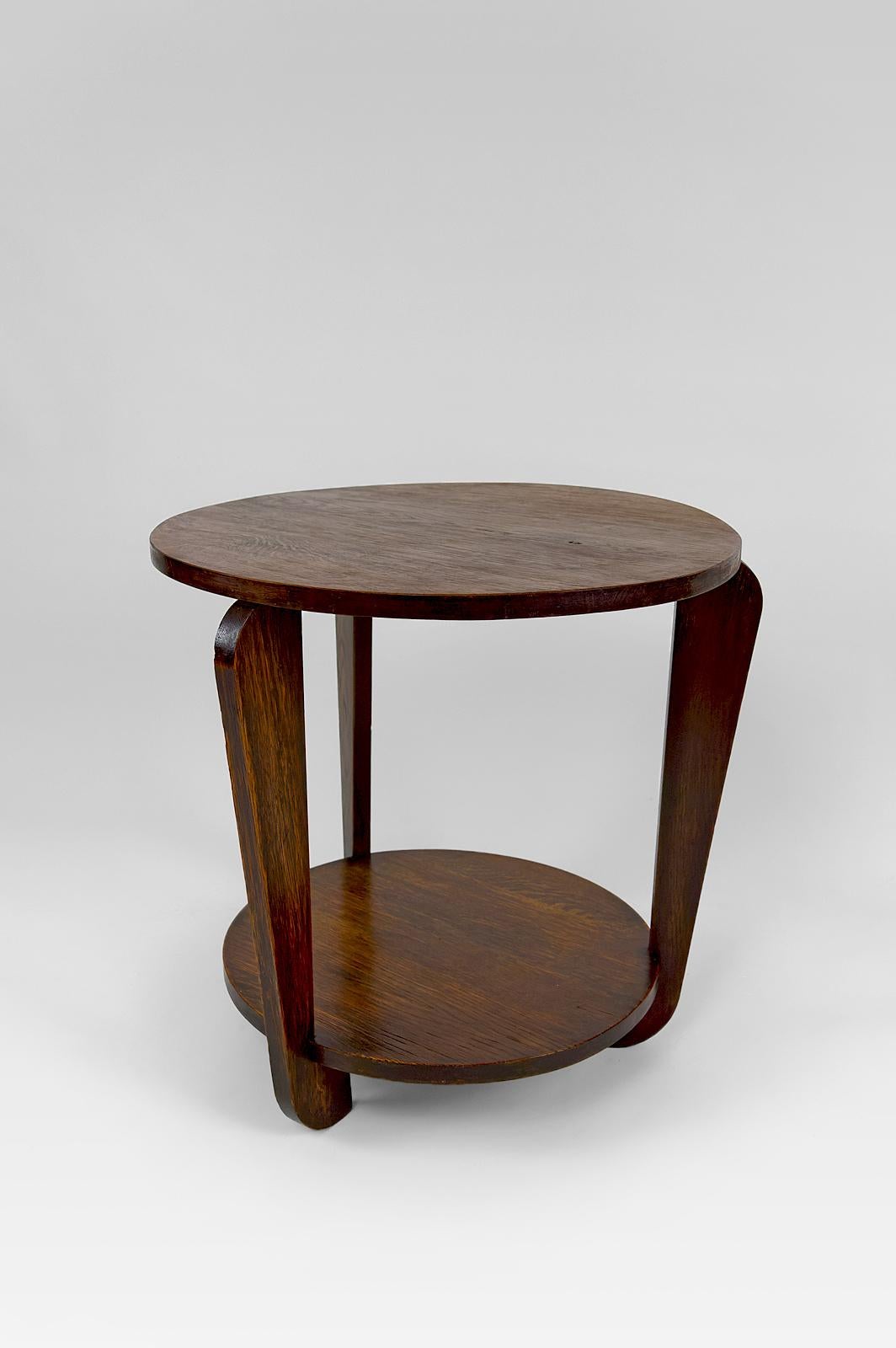 French Modernist Art Deco round pedestal table in patinated oak, France, Circa 1930 For Sale