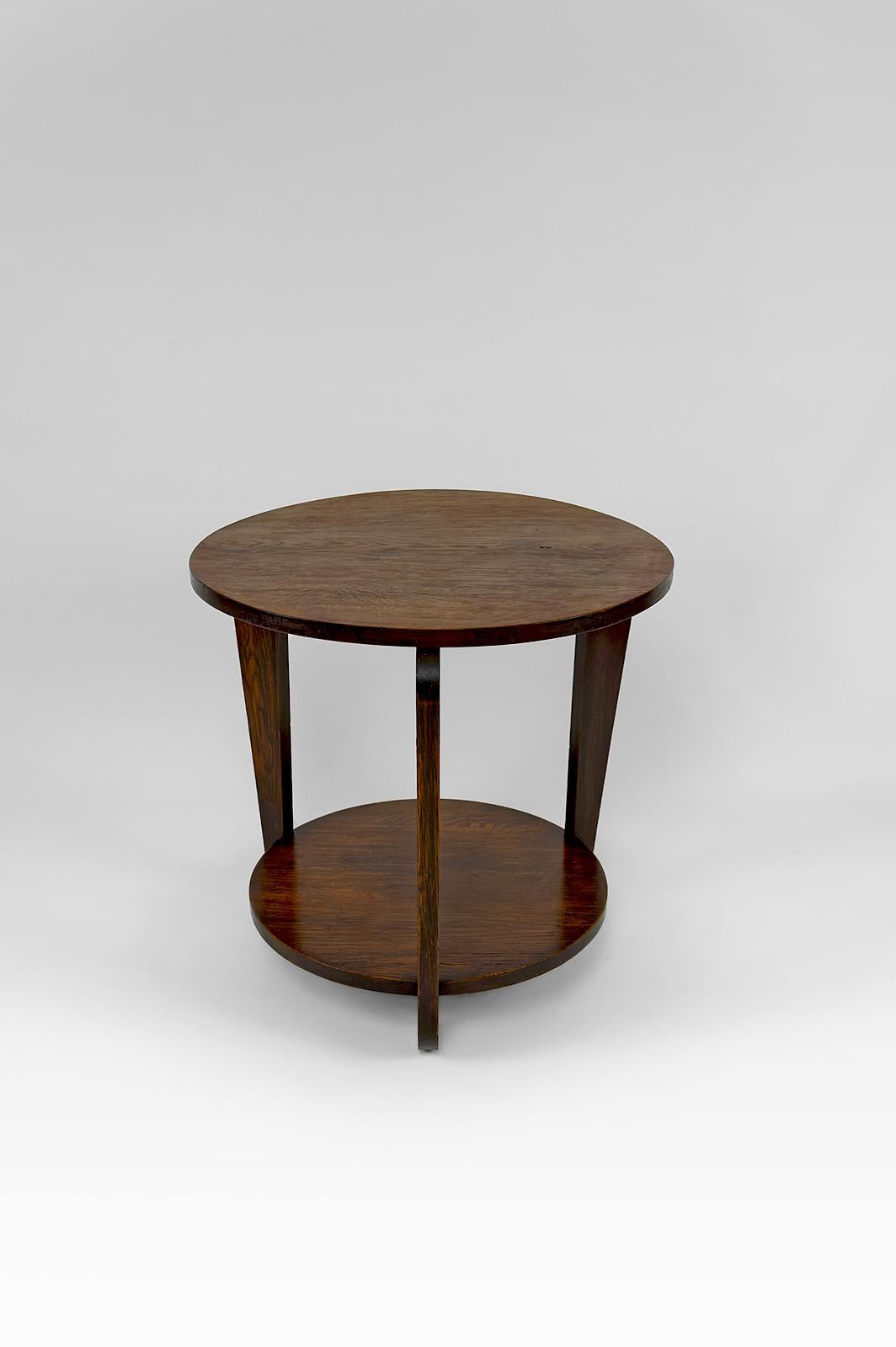 Mid-20th Century Modernist Art Deco round pedestal table in patinated oak, France, Circa 1930 For Sale