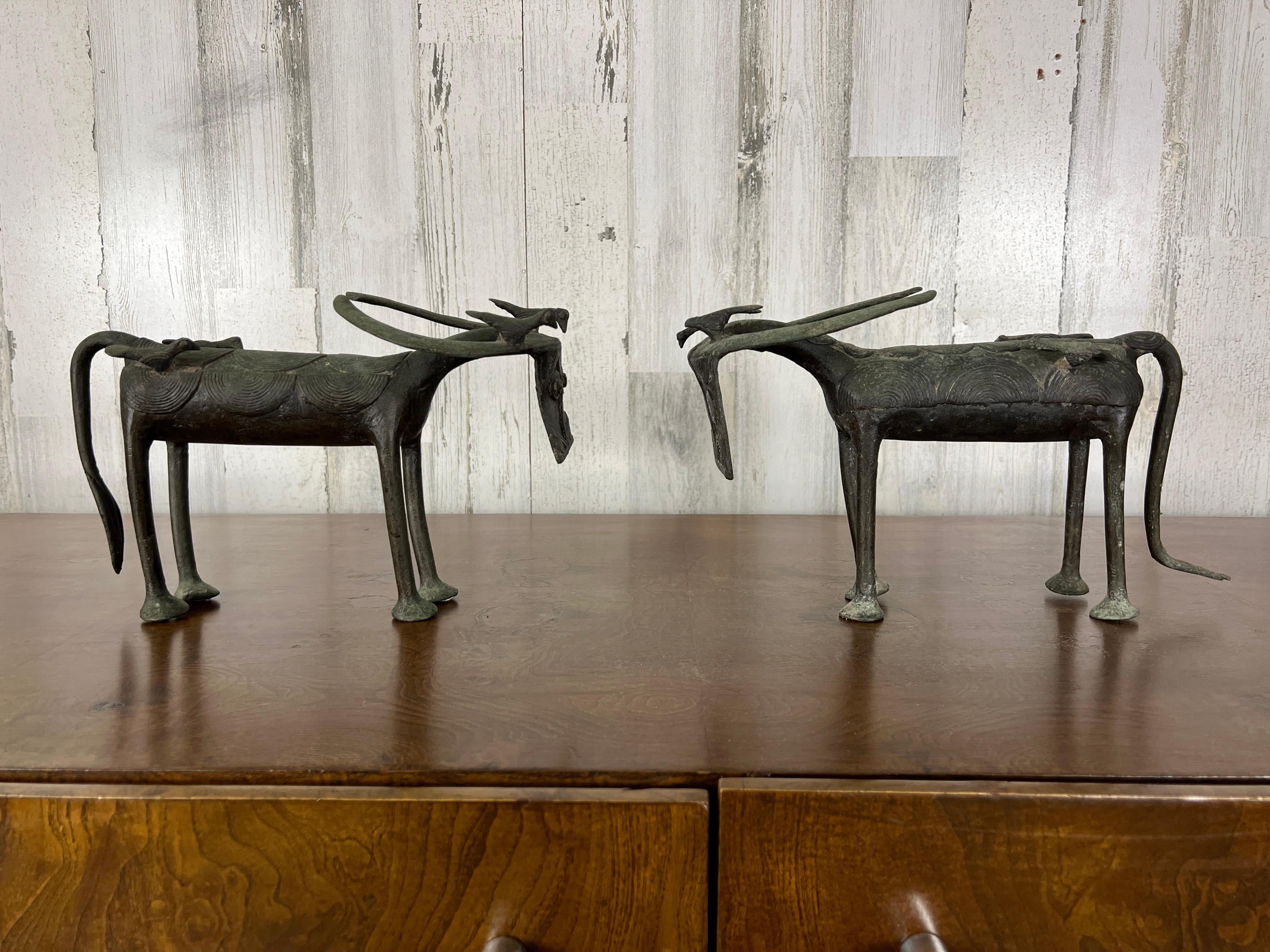 Hard to come by pair of African Ashanti water buffalo, each one is different than the other. Nice patina 