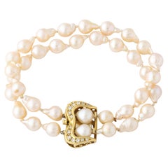 Modernist Baroque Pearl , Gold and Diamond Double Strand Pearl Bracelet 