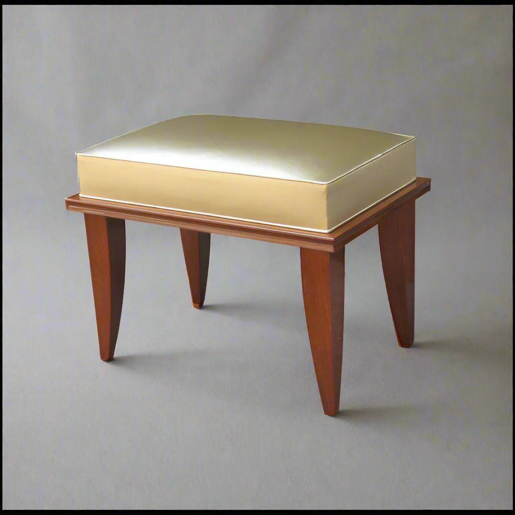 A modernist bench in the style of Leleu.  A boxed rectangular seat supported by a framed base and tapering legs in mahogany in a lacquered finish. 20th Century.