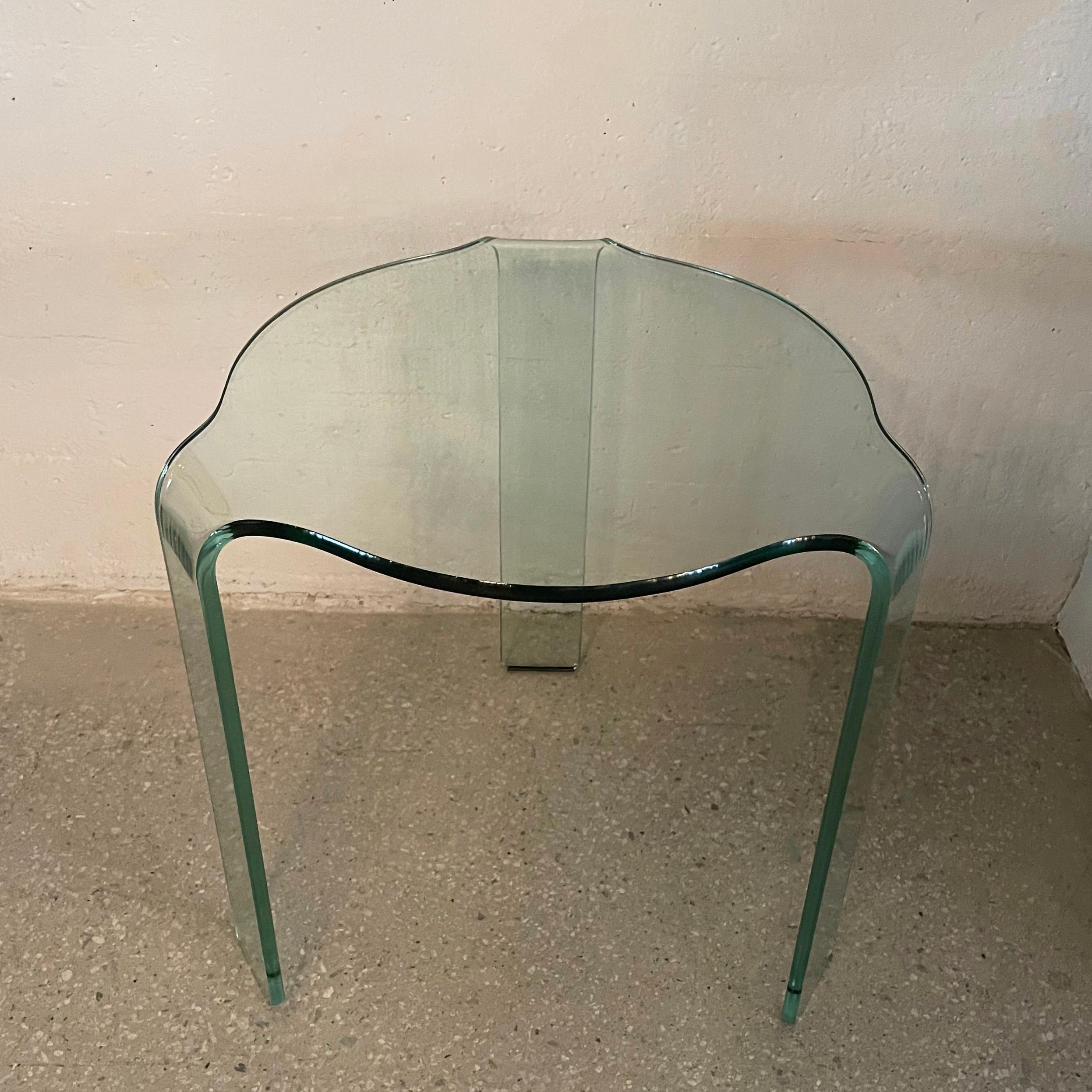 Modernist, bent glass side table with waterfall legs by Vittorio Livi for Fiam Italia, The Pace Collection, circa 1980. This table has also been attributed to Alvar Aalto.