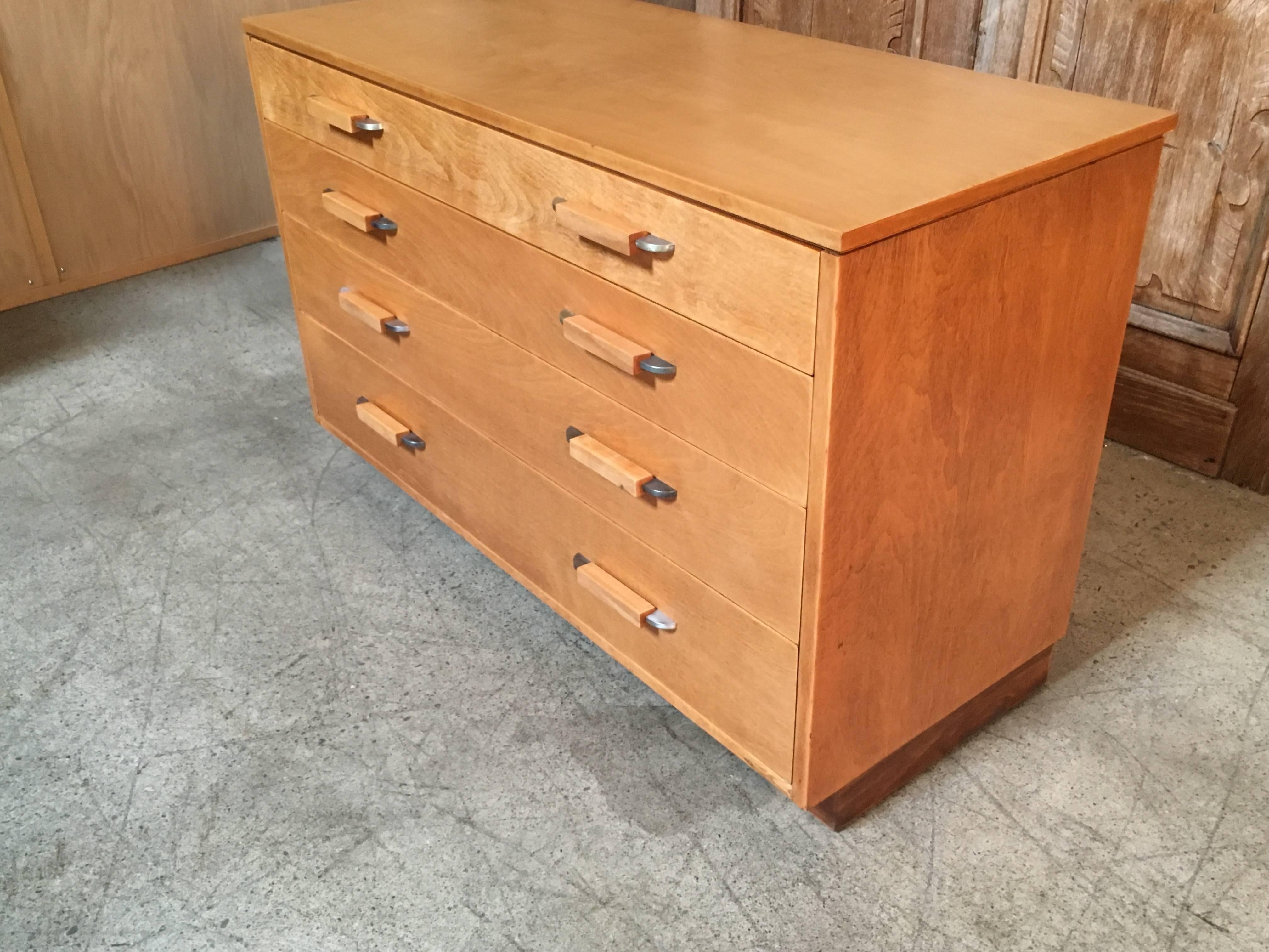 Midcentury Art Deco birch chest or dresser designed by Eliel Saarinen and his daughter Pipsan Saarinen Swanson for the Johnson Furniture Company, American.