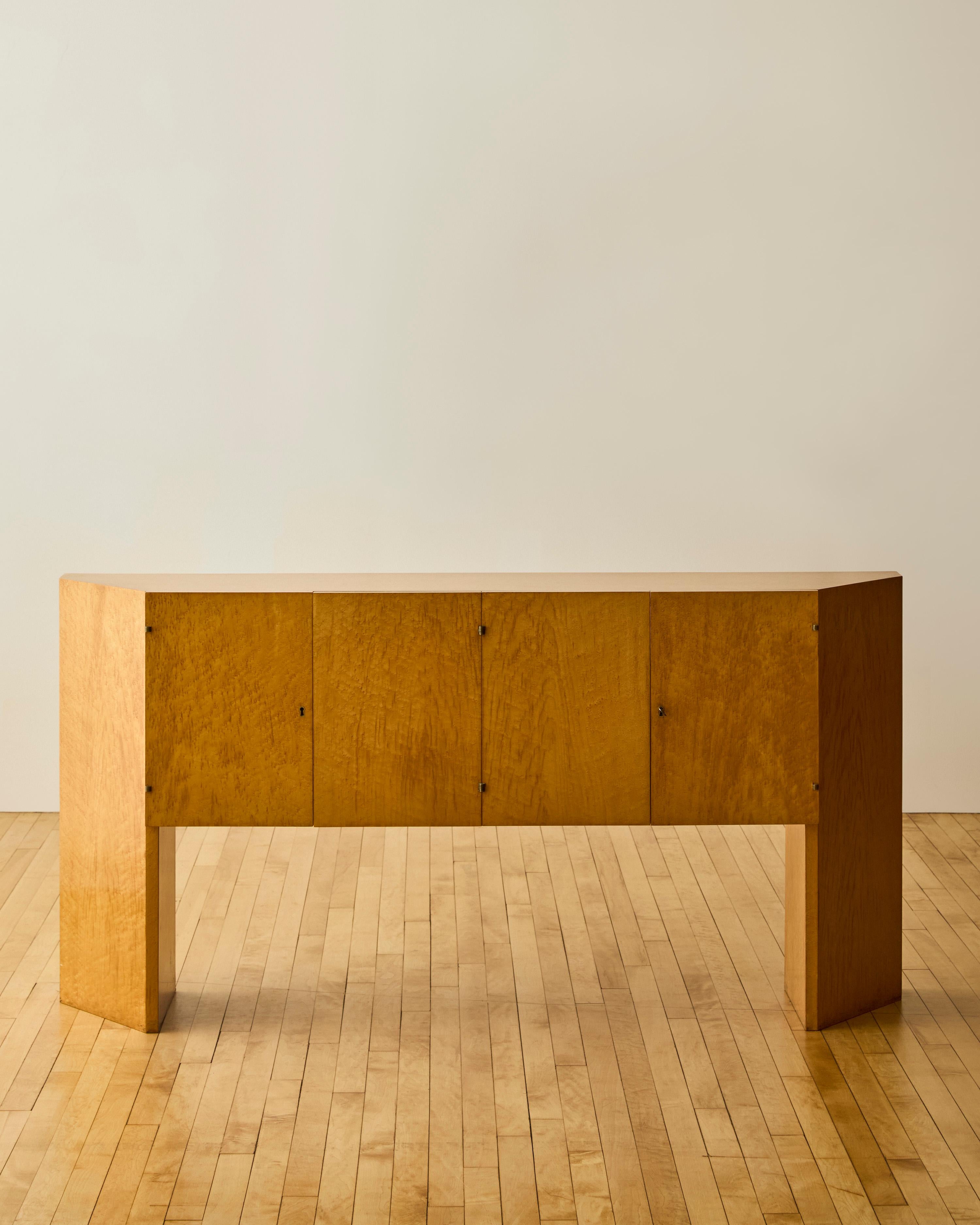 Modernist Birdseye Maple Sideboard with four doors and canted sides C. 1975.