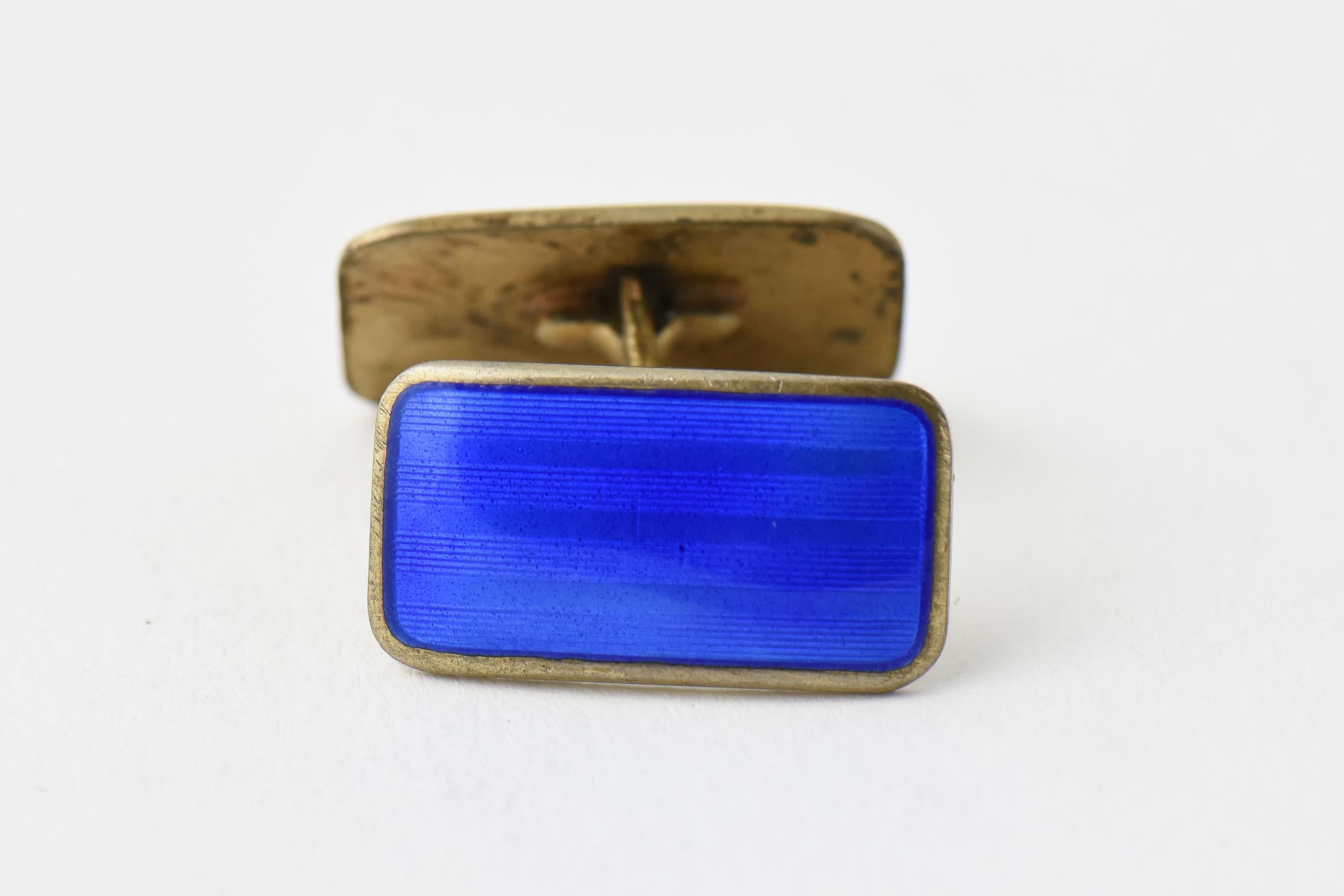 Mid 20th century blue enamel and gilded sterling silver cuff links. Marked: Norne (Aksel Holmsen) Norway 925.