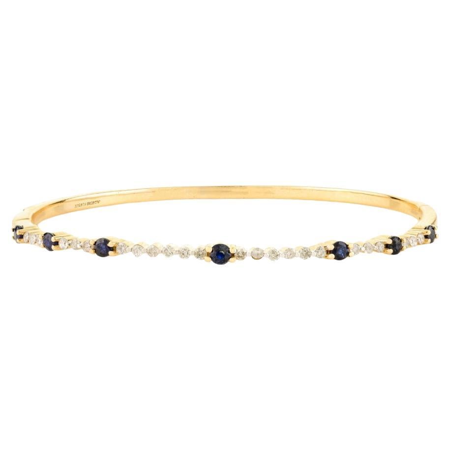 Armreif aus 14 Karat Gelbgold mit blauem Saphir und Diamant im modernistischen Stil für Mutter