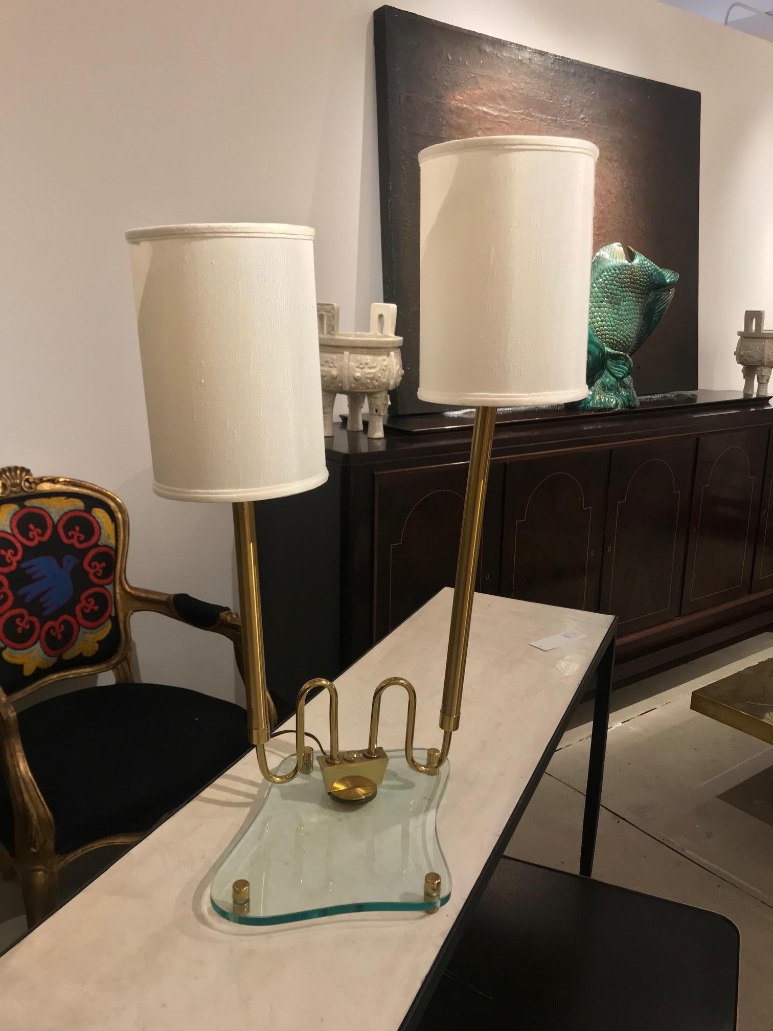 Modernist brass and glass lamp in the style of Fontana Arte.



 