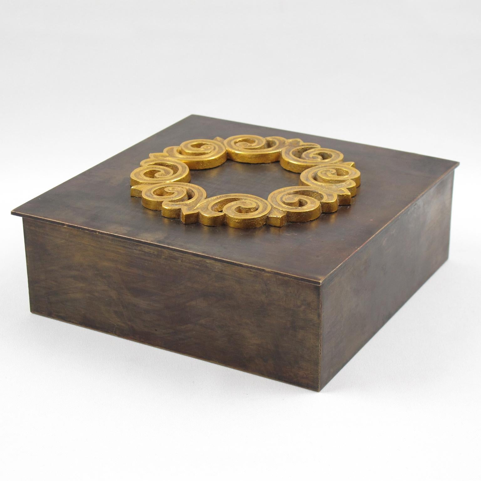 This stunning decorative box was crafted in France in the 1940s. The geometric square shape has a modernist minimalist design with industrial flair. The quality brass metal has an industrial-like dark brown original patina. The piece boasts a