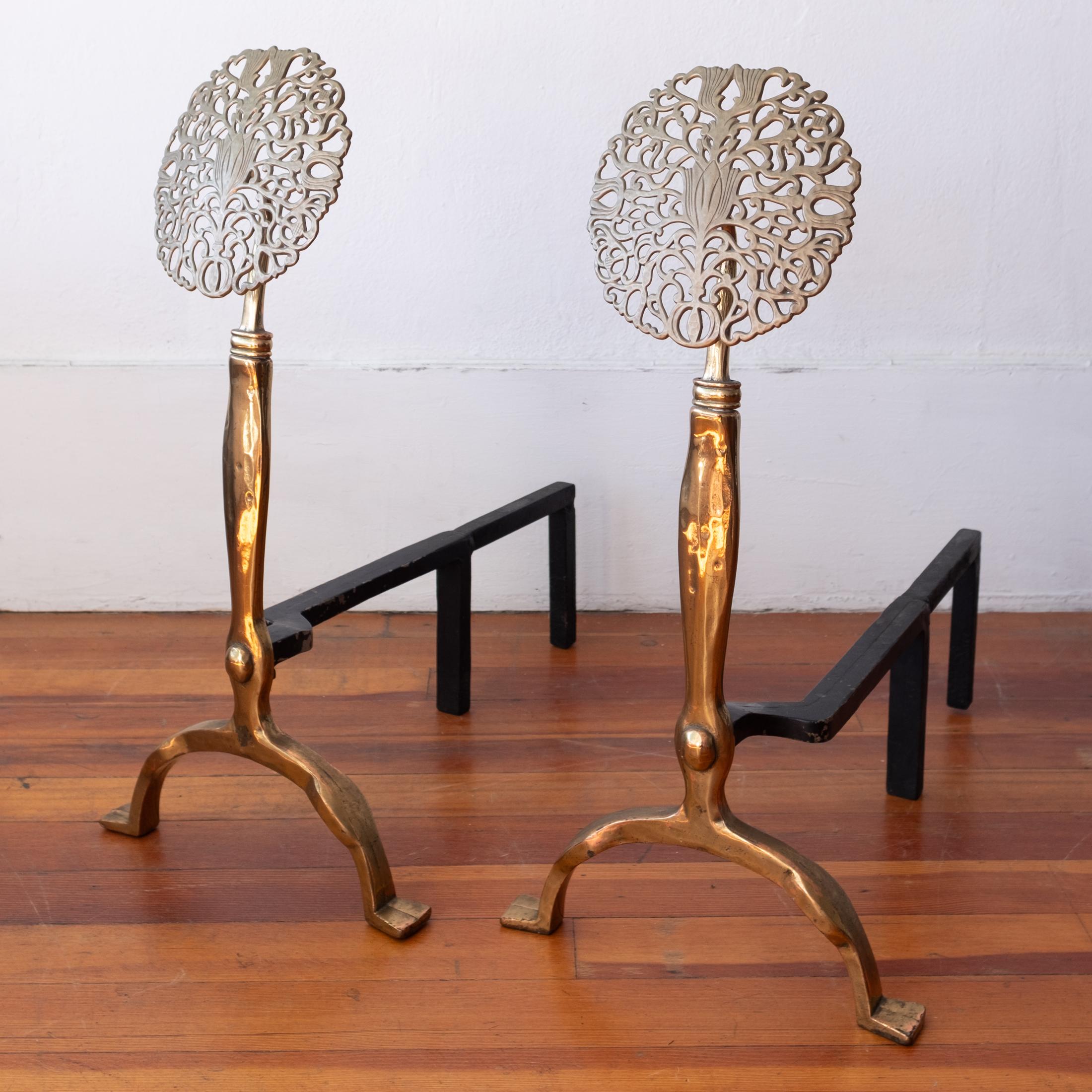 A wonderful pair of brass flower large scale andirons. Hollywood Regency meets Aesthetic movement.  