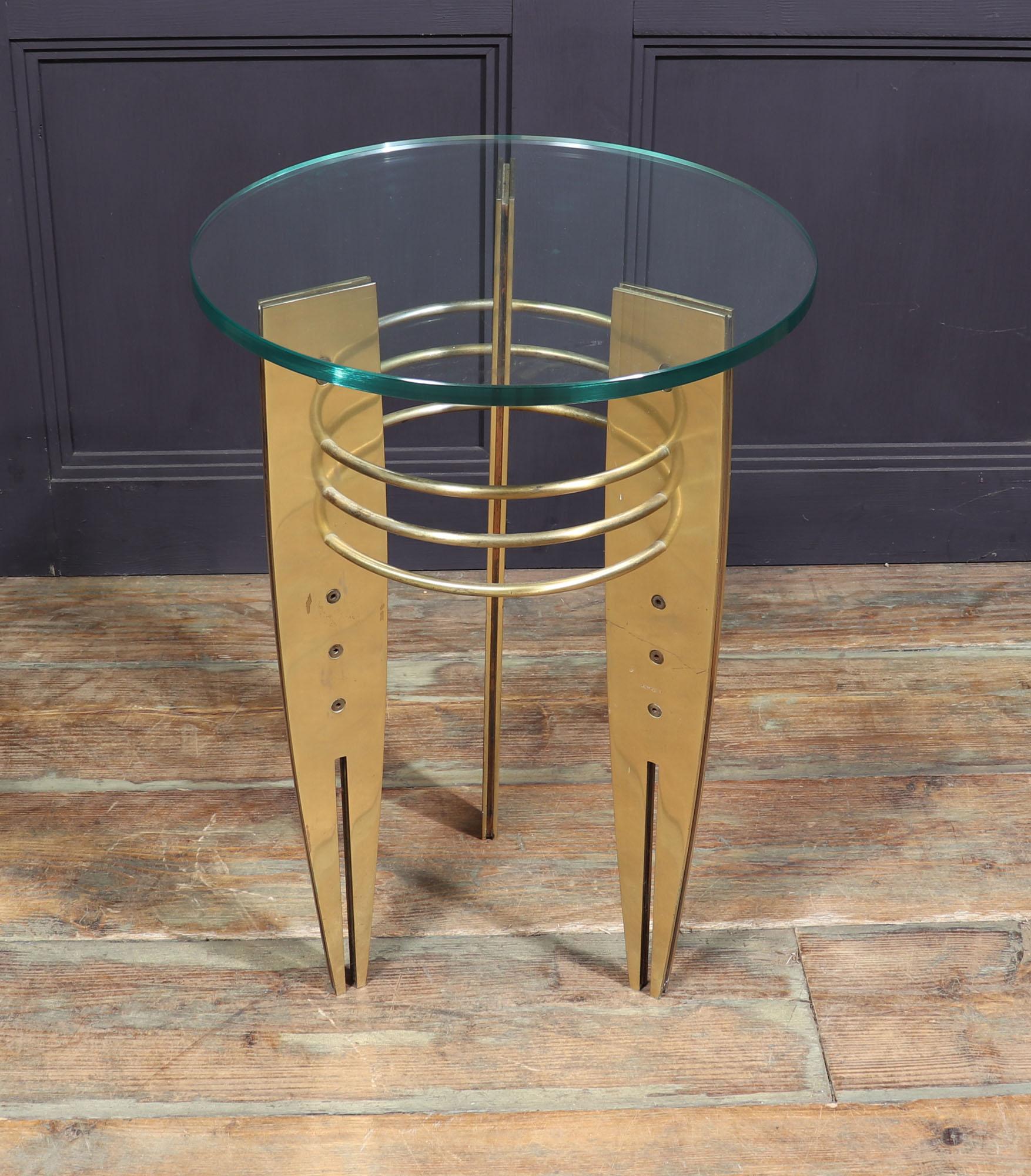 MODERNIST ROCKET TABLE.
A Modernist design side table in solid brass dating to around 1970, it has a new 15mm glass top and with a few light marks other wise in very good condition throughout

If you looking for something unique and out of the