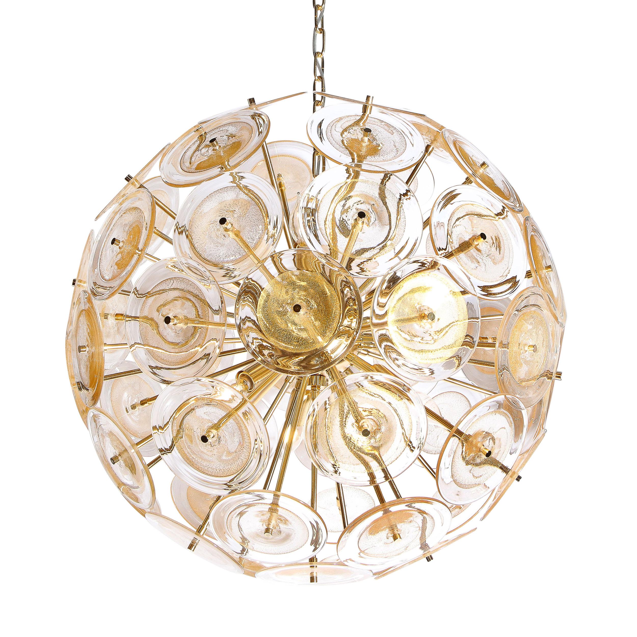 This dramatic and graphic Sputnik was realized in Murano, Italy- the island off the coast of Venice renowned for centuries for its superlative glass production. It features a wealth of brushed brass rods emanating from circular body of the same