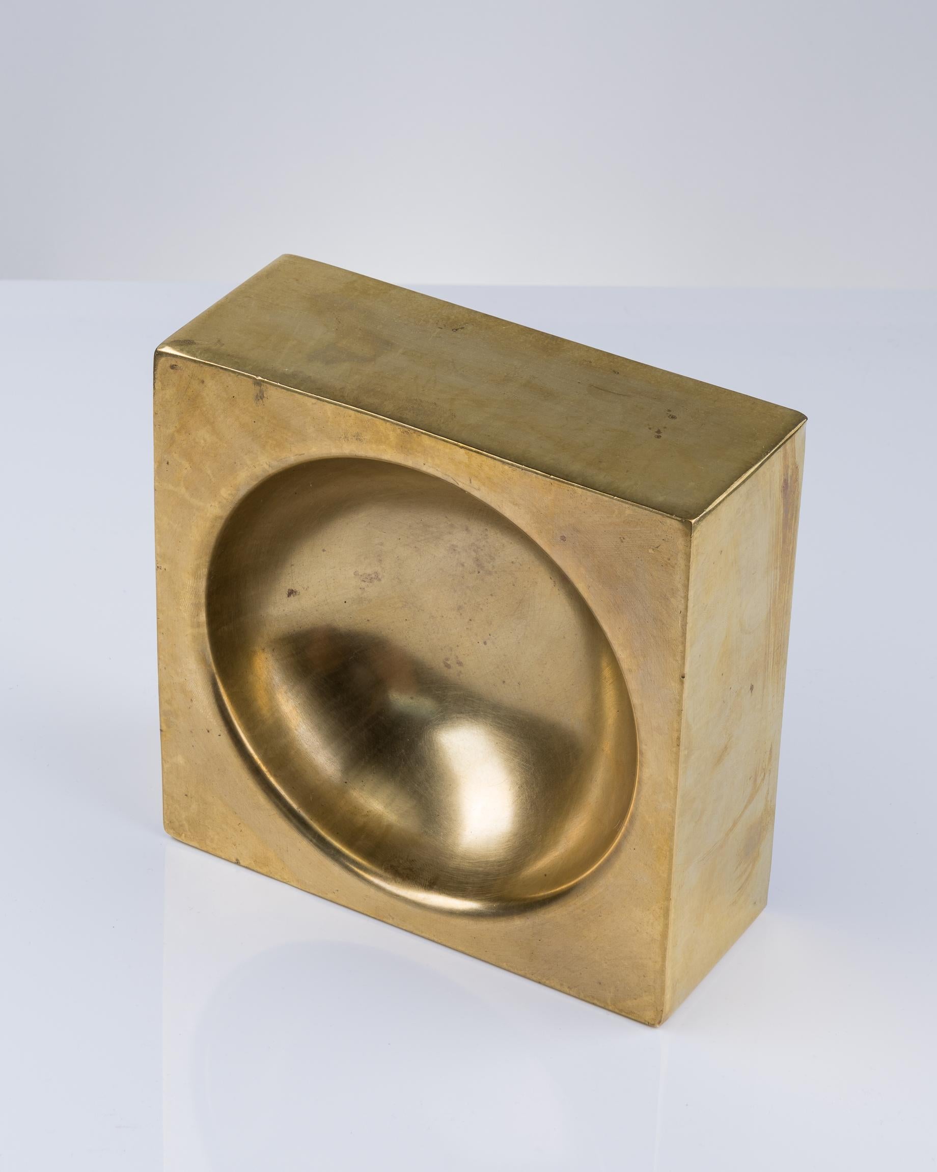 Minimalist patinated full metal catchall
This rare seamless vide poche is made of an embossed single sheet of brass
in very good vintage condition
this item will ship from France and can be returned to either France or upstate NY location in the
